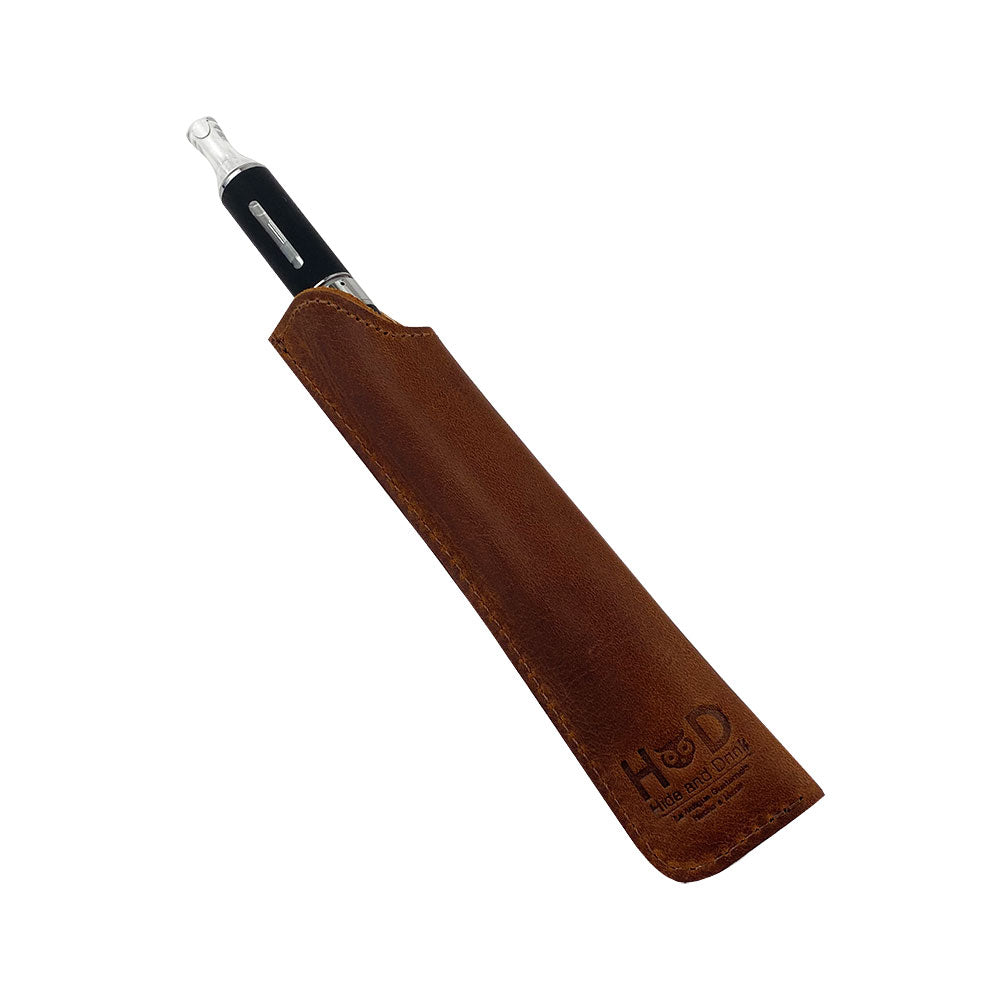 The Hide & Drink Vape Pen Sleeve holding a vape pen, showcasing its practical and stylish design in Full Grain Leather. This artisan piece is hand cut and hand sewn, perfect for those who appreciate craftsmanship. Handmade in La Antigua Guatemala & Oaxaca Mexico. Pen Case, Small Batch Production.