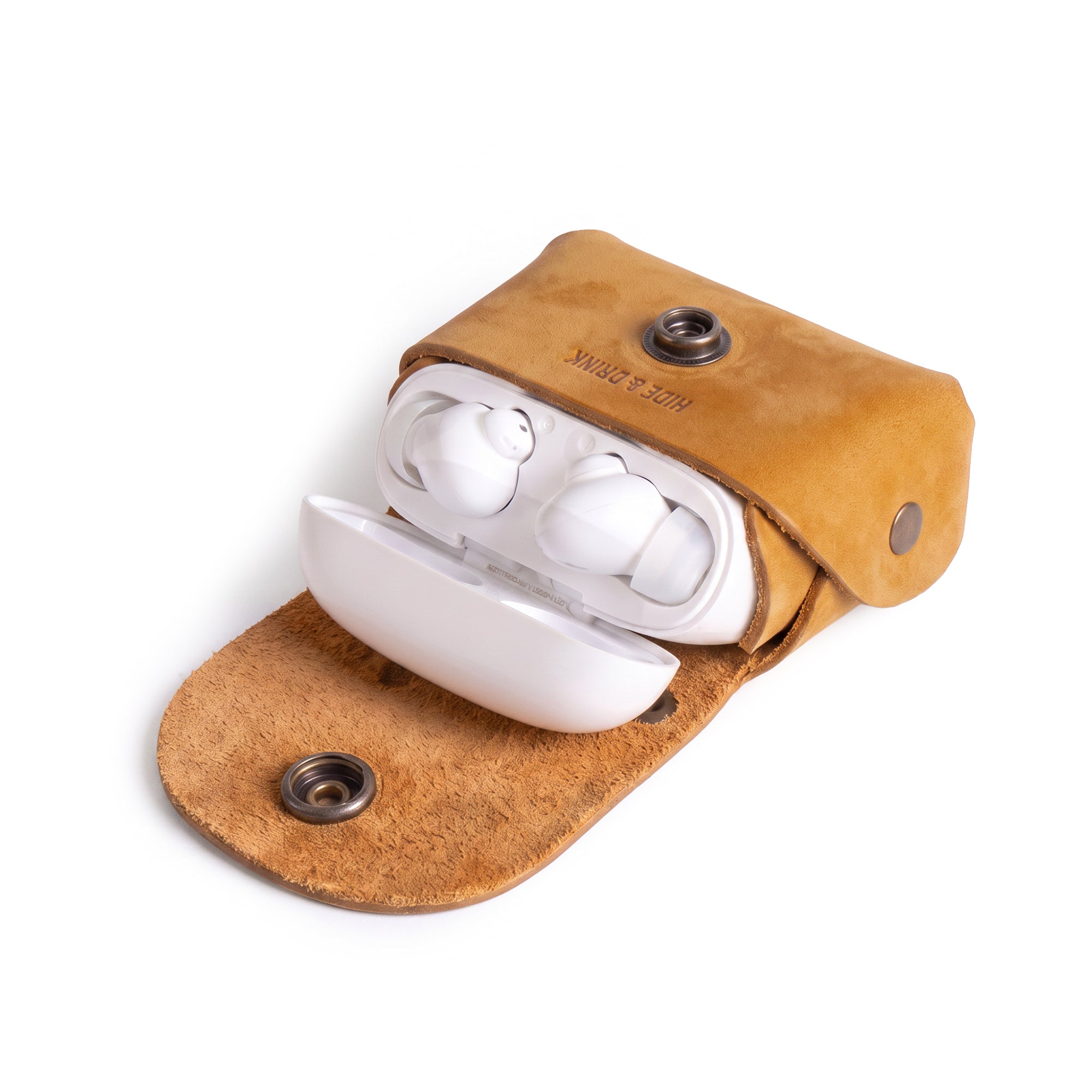 Open view of the mustard Tiny Handbag Keychain by Hide & Drink, showcasing a Tiny Handbag with Key Ring Holder with coins inside, crafted from Full Grain Leather. This stylish accessory is part of Small Batch Production, Hand Cut, Hand Sewn, and Fire Branded, proudly made by artisans in La Antigua Guatemala & Oaxaca Mexico.