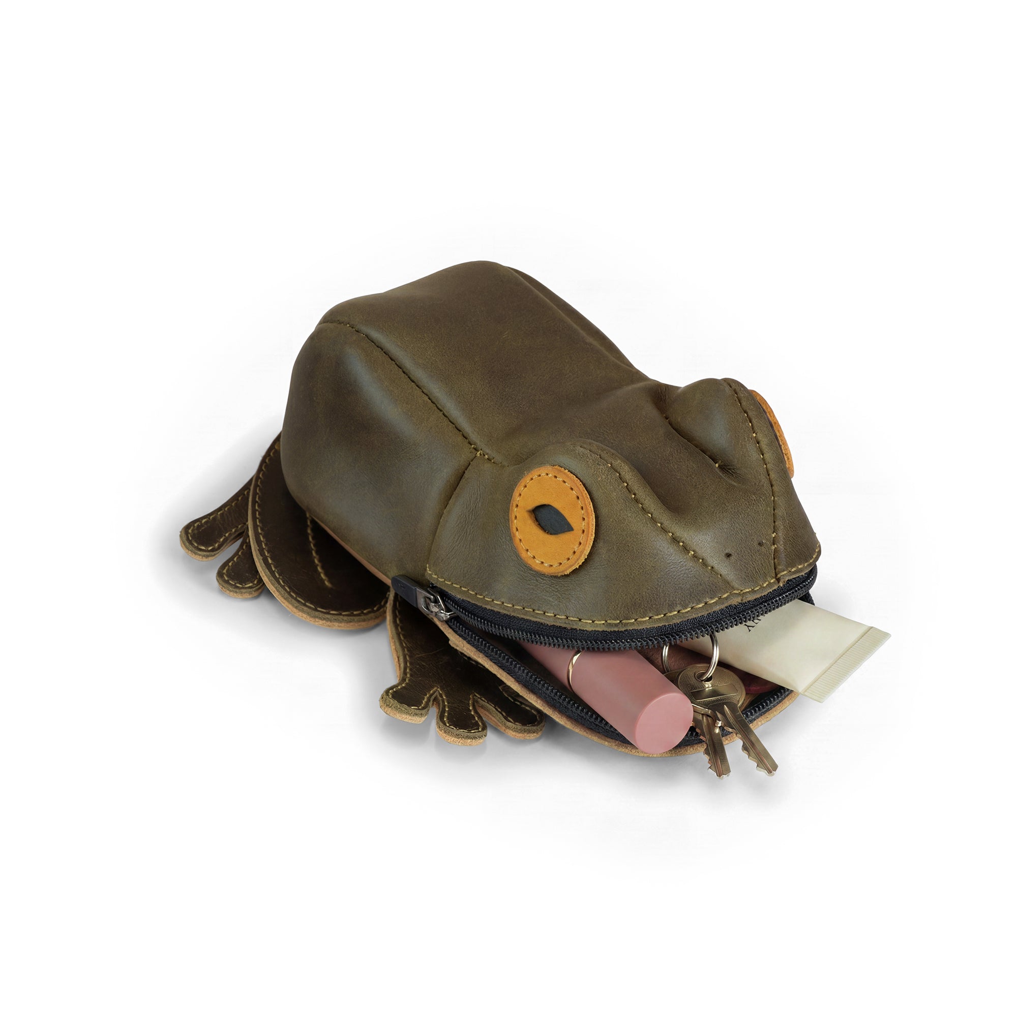 Open view of Tudi Frudi's Frog Pouch, showing its spacious interior designed for small items. This full grain leather frog pouch is ideal for organizing cables or as a small accessory case, highlighting artisan craftsmanship from La Antigua Guatemala & Oaxaca Mexico.