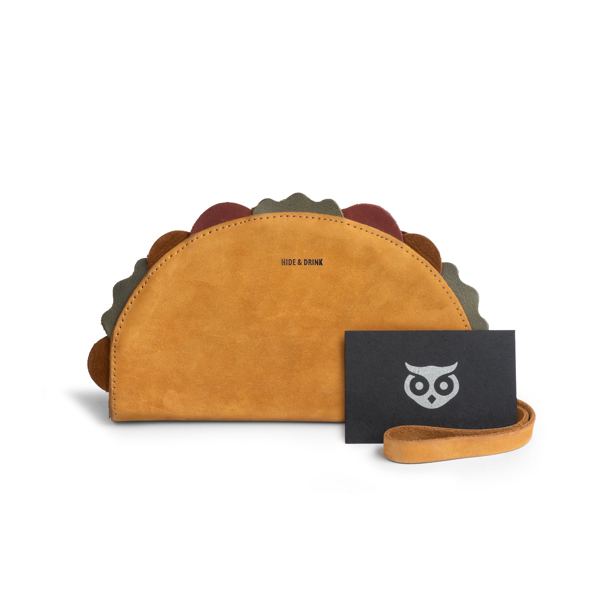 The front view of the Multipurpose Taco Wallet by Hide & Drink, highlighting its rustic charm and Full Grain Leather texture. A great accessory to elevate your travel and back-to-school vibe, this fun wallet also doubles as a perfect gift idea for graduation or gifts for him, fitting seamlessly into your wallets and women's collection.