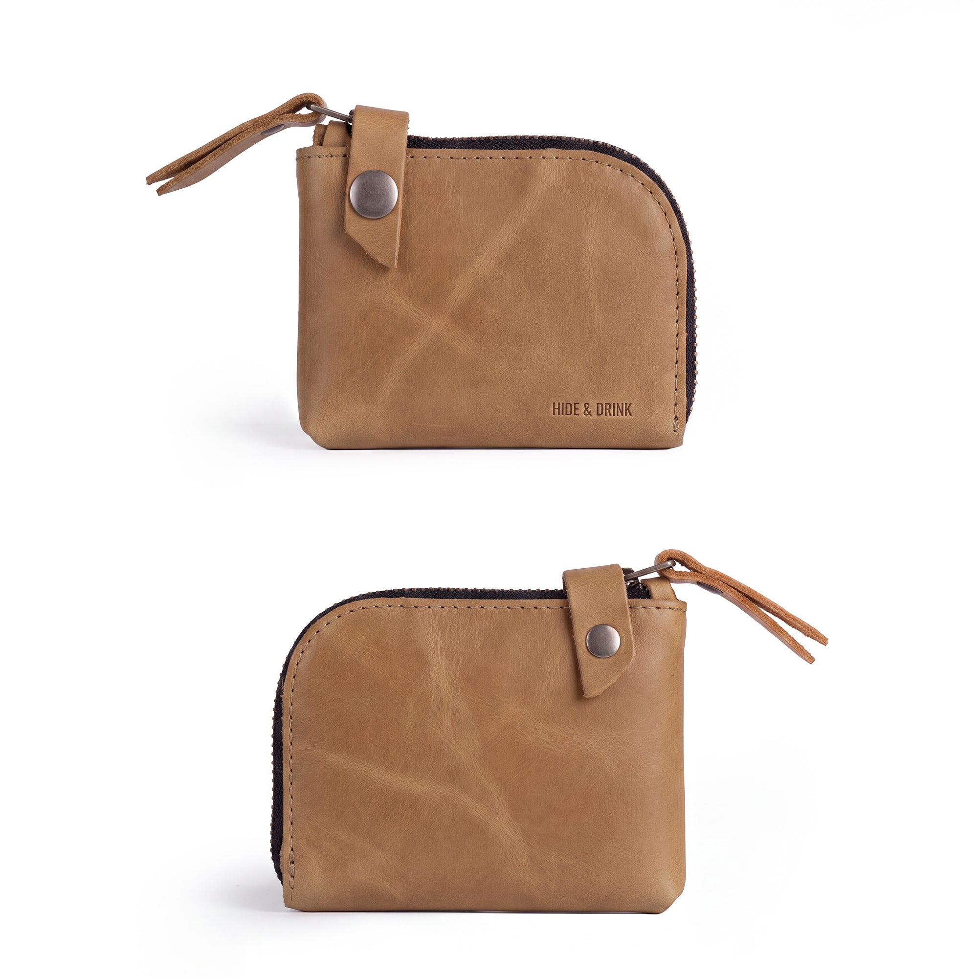 Interior view of the Lion's Mane Zippered Wallet by Hide & Drink, showcasing its multi-organization capabilities for coins and cards, an artisan's craftsmanship.