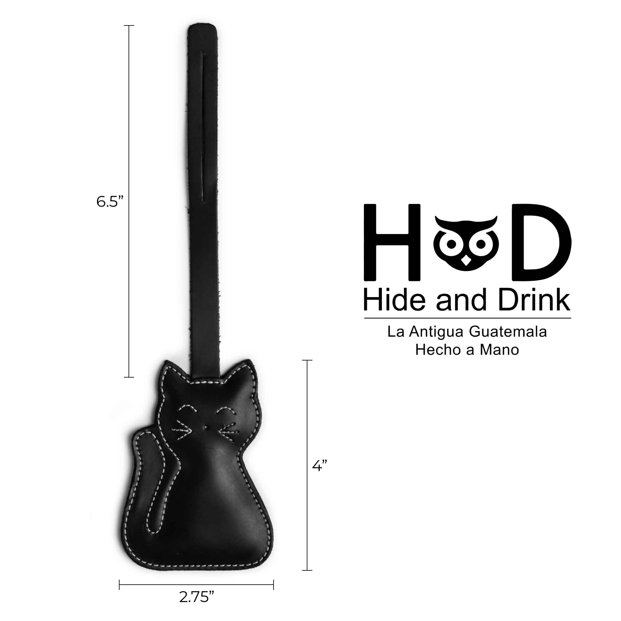 Hide & Drink Bag Charms illustrating dimensions for a golden cat design. This charm for handbags is perfect as a purse charm for tote & backpacks, made from high-quality full grain leather. Capturing StockyardX's commitment to small batch production, each piece exhibits hand cut and hand sewn precision along with fire branding, handmade in La Antigua Guatemala & Oaxaca Mexico.