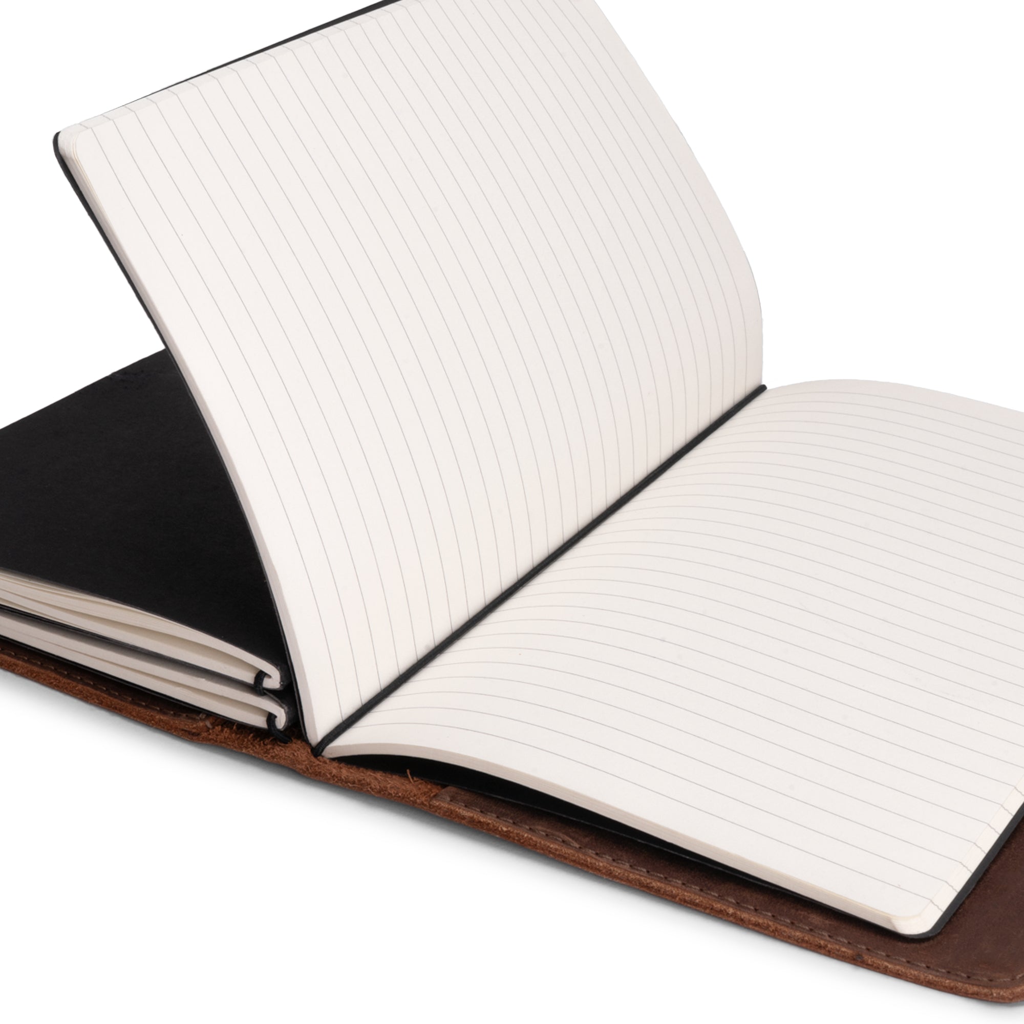 Rustic Cover for A5 Notebooks (5.75 x 8.25 in.) by Leather Worx, displaying an open view of lined pages within its refillable cover. Crafted from premium full grain leather in small batch production, hand cut and hand sewn by artisans in La Antigua Guatemala & Oaxaca Mexico.