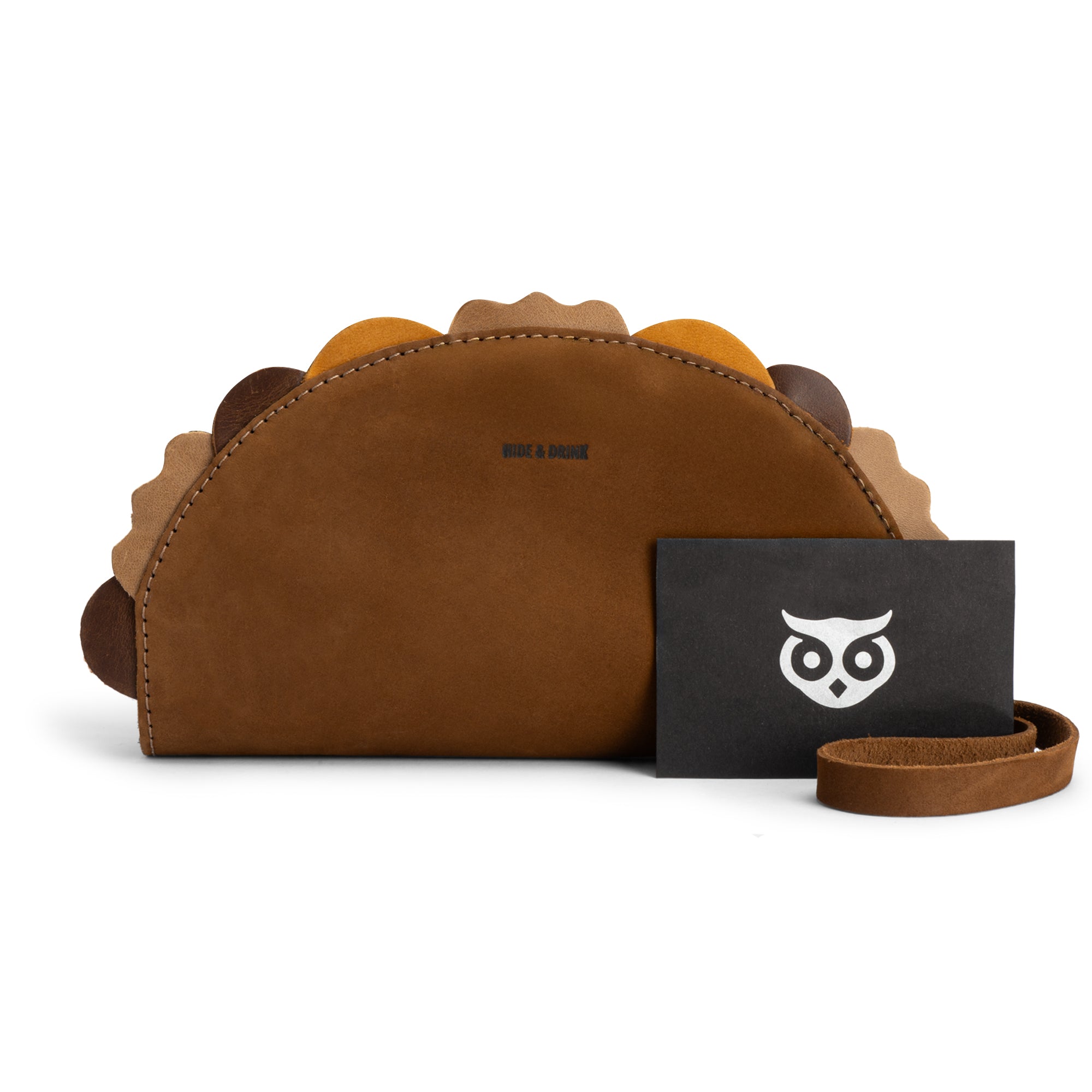 The elegant front view of the Multipurpose Taco Wallet by Hide & Drink, made from premium Full Grain Leather. This eye-catching accessory is perfect for travel, back-to-school, and is an excellent gift idea for graduation or for him, fitting nicely into your wallets and women's collection and enhancing your accessories collection.