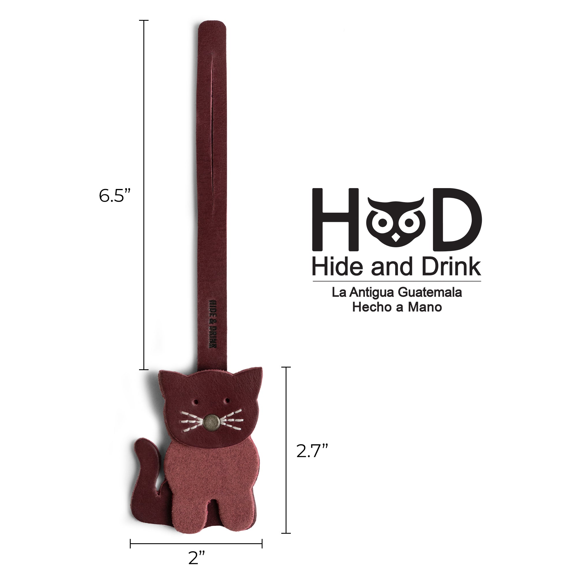Hide & Drink Bag Charms featuring dimensions for a charming cat design. This charm for handbags is ideal as a purse charm for tote & backpacks, crafted from premium full grain leather. Each piece captures StockyardX's dedication to small batch production with hand cut, hand sewn precision and fire branding for added artisan touch, handmade in La Antigua Guatemala & Oaxaca Mexico.