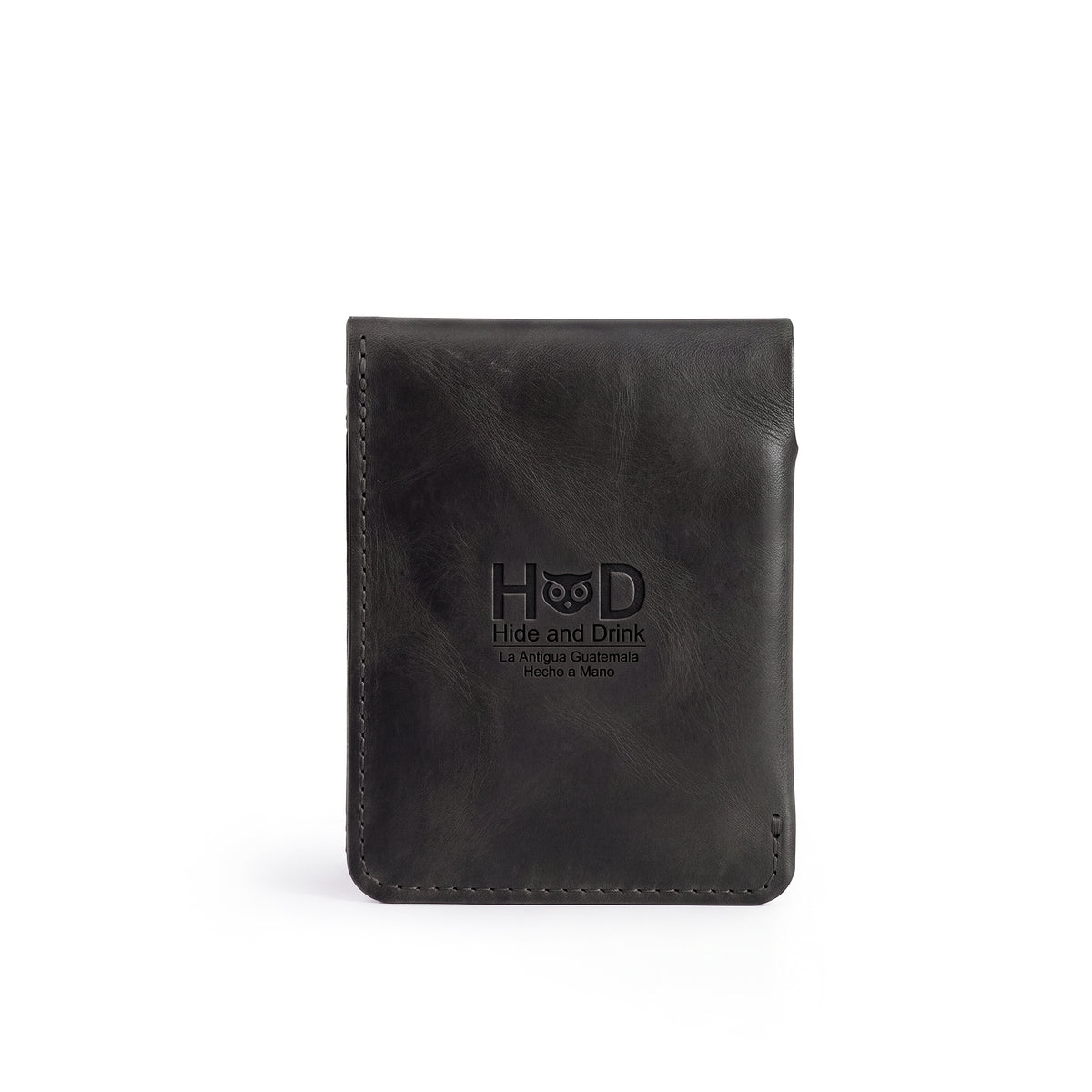 Hide & Drink Slim Card Holder with logo, a beautifully crafted vertical card holder made from full grain leather. Designed to hold up to 4 cards and cash, it reflects the artisan quality and small batch production from La Antigua Guatemala.