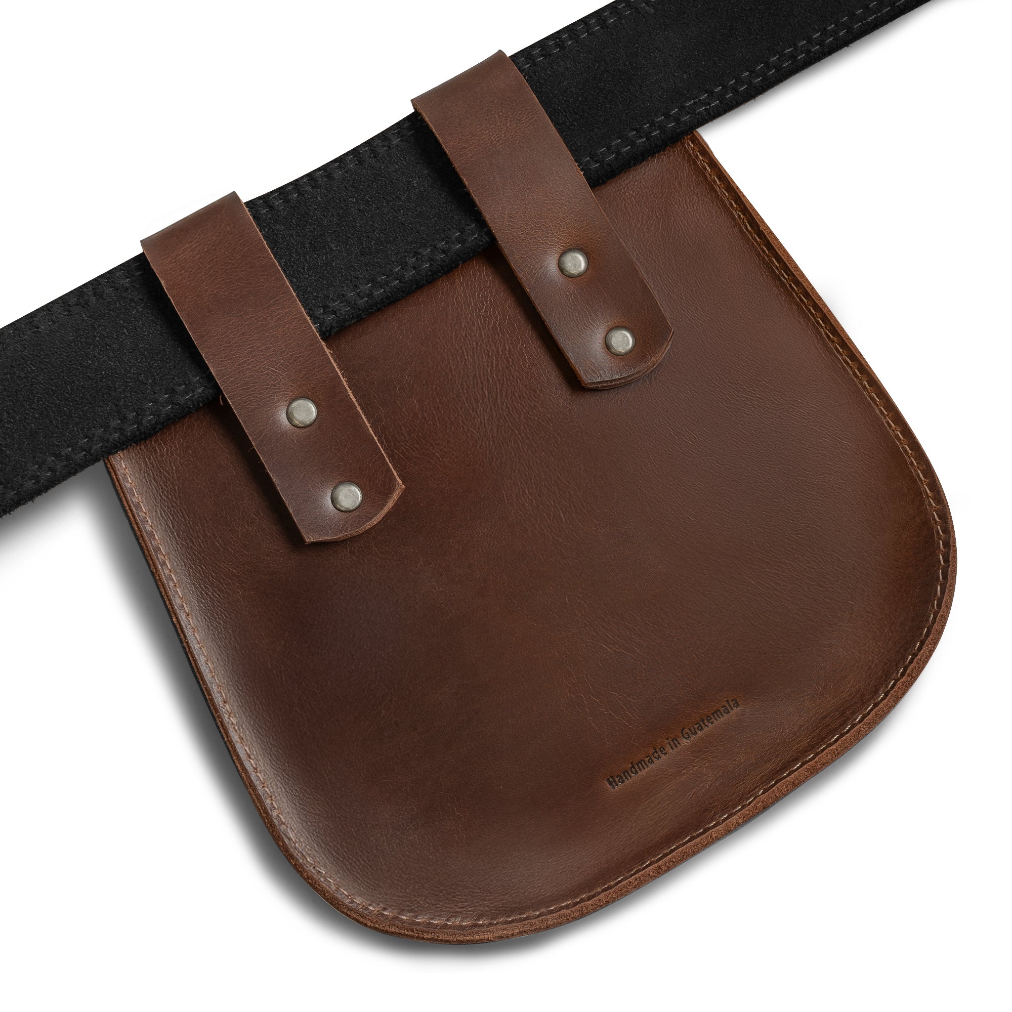 The Forester, Waist Bag by Valhalla Gear is displayed attached to a belt, emphasizing its secure fit and practical design. This Medieval Style Waist Bag for Outdoors serves as a Leather Tool Organizer Belt Pouch, featuring vintage loops for belts suitable for both men and women. Handcrafted from full grain leather, this unique item showcases artisan quality with its handmade production in La Antigua Guatemala & Oaxaca Mexico.