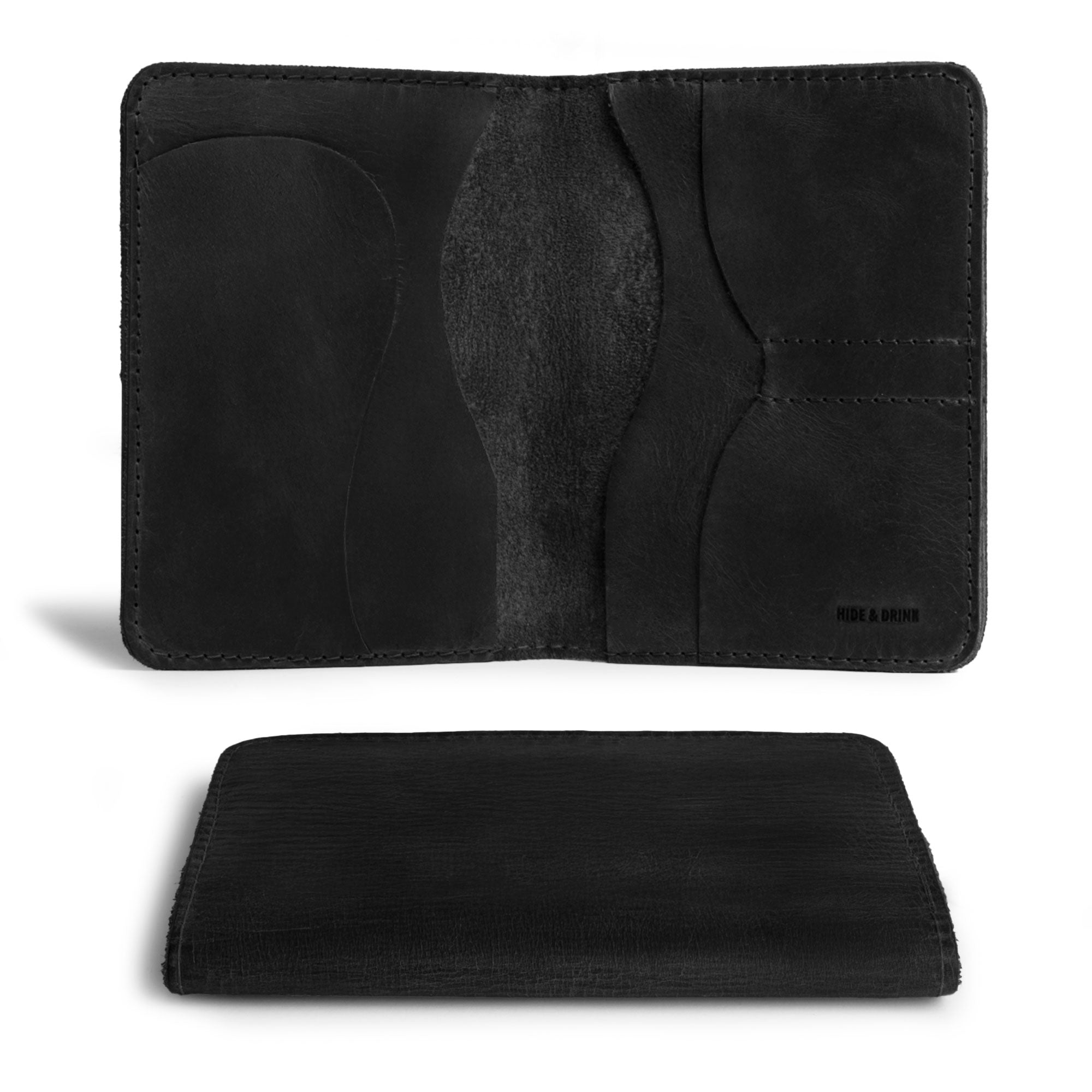 Another perspective of Hide & Drink's black Double Passport Wallet W/Key Slot, underlining the wallet's design and slots, a perfect rustic case for organized travel essentials crafted by local artisans.