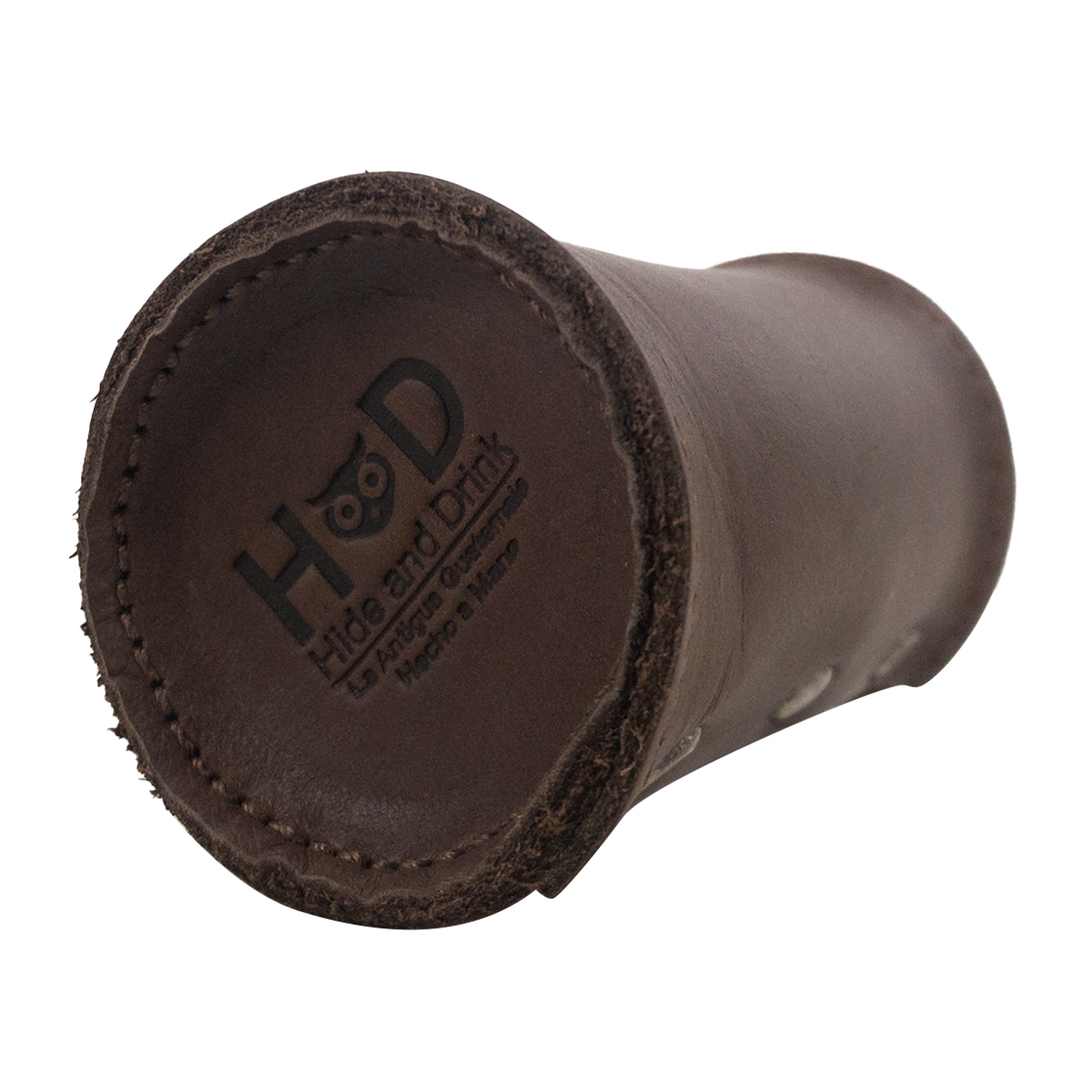 The bottom view of the Doggie Bag Dispenser by Hide & Drink, highlighting its handcrafted craftsmanship with a fire branded logo. This thick full grain leather poop bag holder is great for dog walkers looking for a stylish waste bag solution, featuring a brass metal clip for easy attachment.