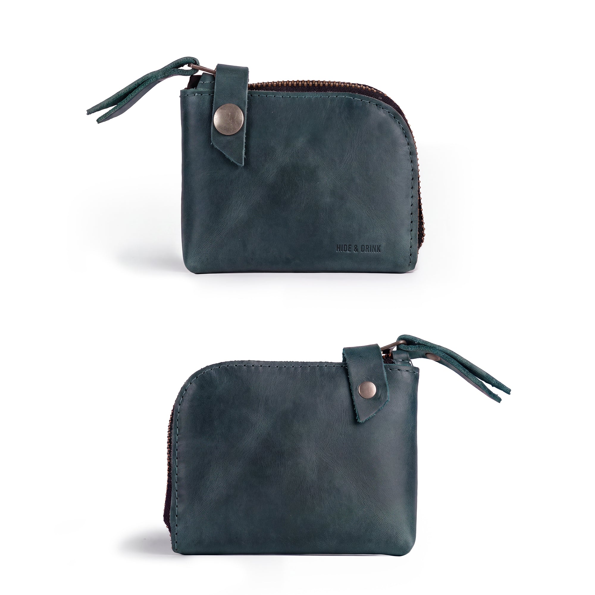 Side view of the blue Lion's Mane Zippered Wallet by Hide & Drink, showcasing its sleek design. Ideal for those looking for a stylish and durable means of organizing their essentials.