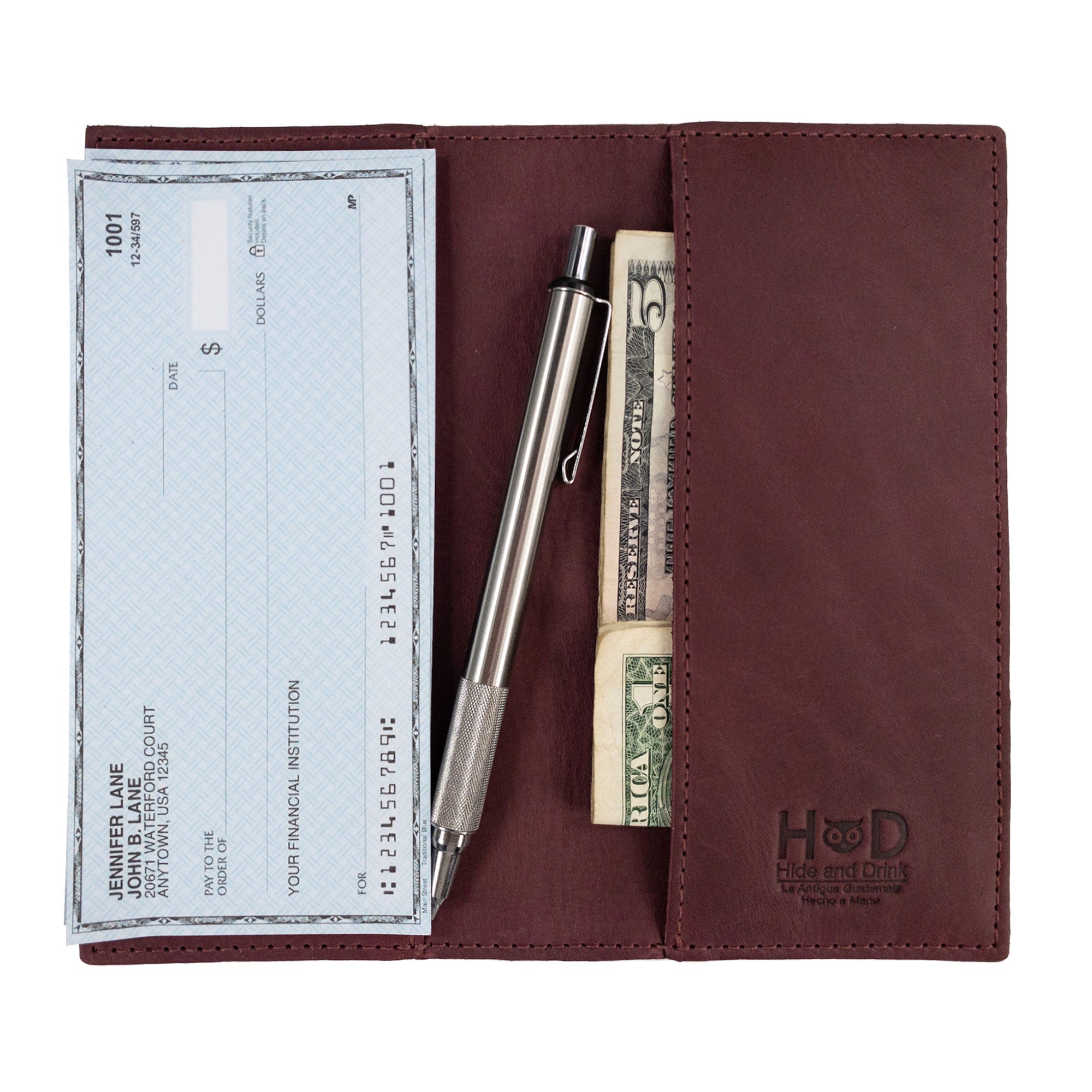 Checkbook Leather Cover by Hide & Drink displayed in lively colors, highlighting its use as a minimalist organizer for standard checkbooks. This handmade item, crafted from full grain leather, reflects artisan traditions and small batch production from La Antigua Guatemala and Oaxaca Mexico.