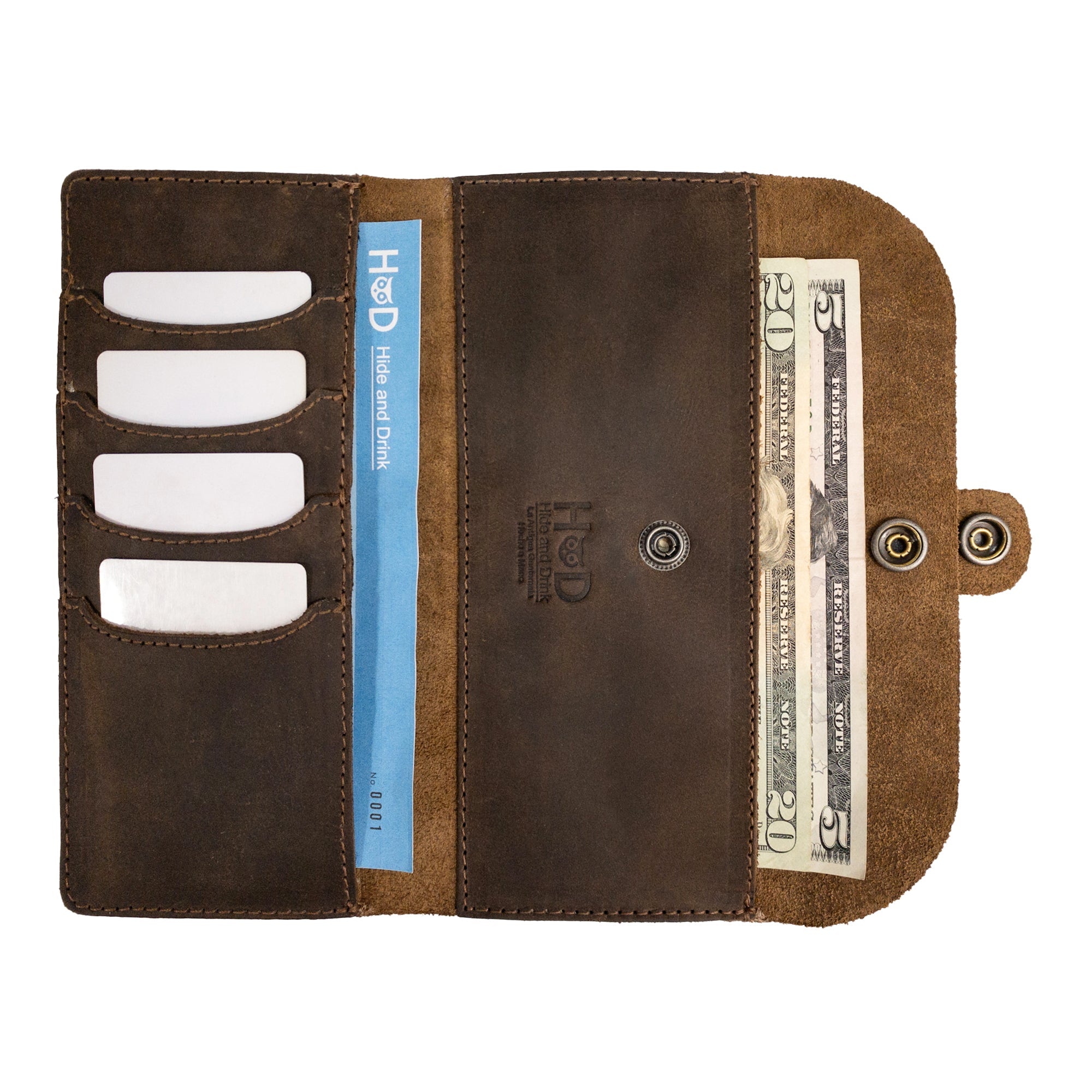 Image showing the interior of the Folio Wallet With Pouch by Hide & Drink, showcasing slots to hold up to 4 cards, along with ample space for flat bills and coins. This Folio Wallet is made from durable full grain leather, featuring handmade craftsmanship with fire branded details, perfect for travel and daily organization.