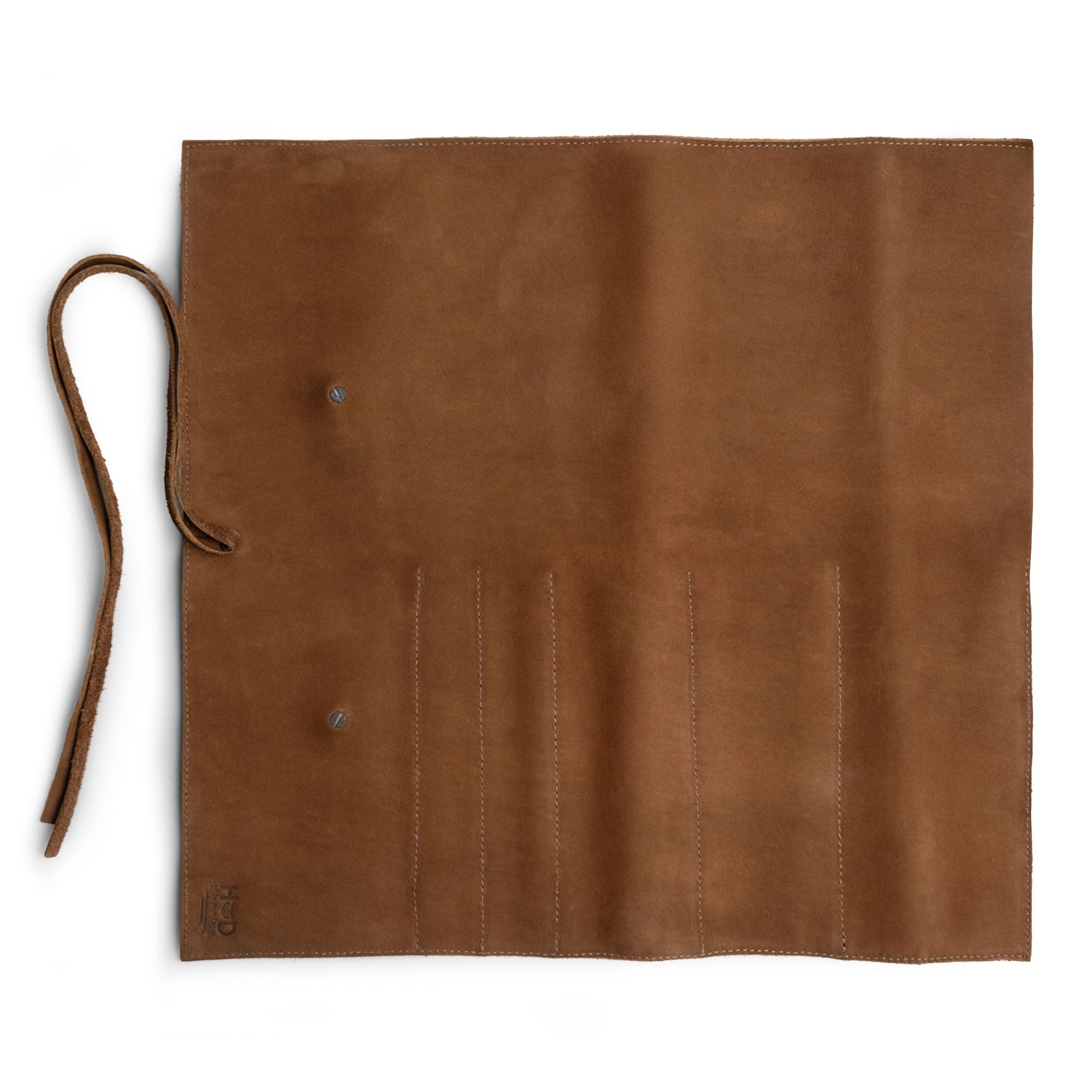 Hide & Drink Knife Roll (5 Pockets) opened to reveal its inner pockets made from durable Full Grain Leather. This Chef Knife Bag is a stylish portable carrying case for knives, benefiting from handmade techniques and small batch production done by skilled artisans in La Antigua Guatemala & Oaxaca Mexico.