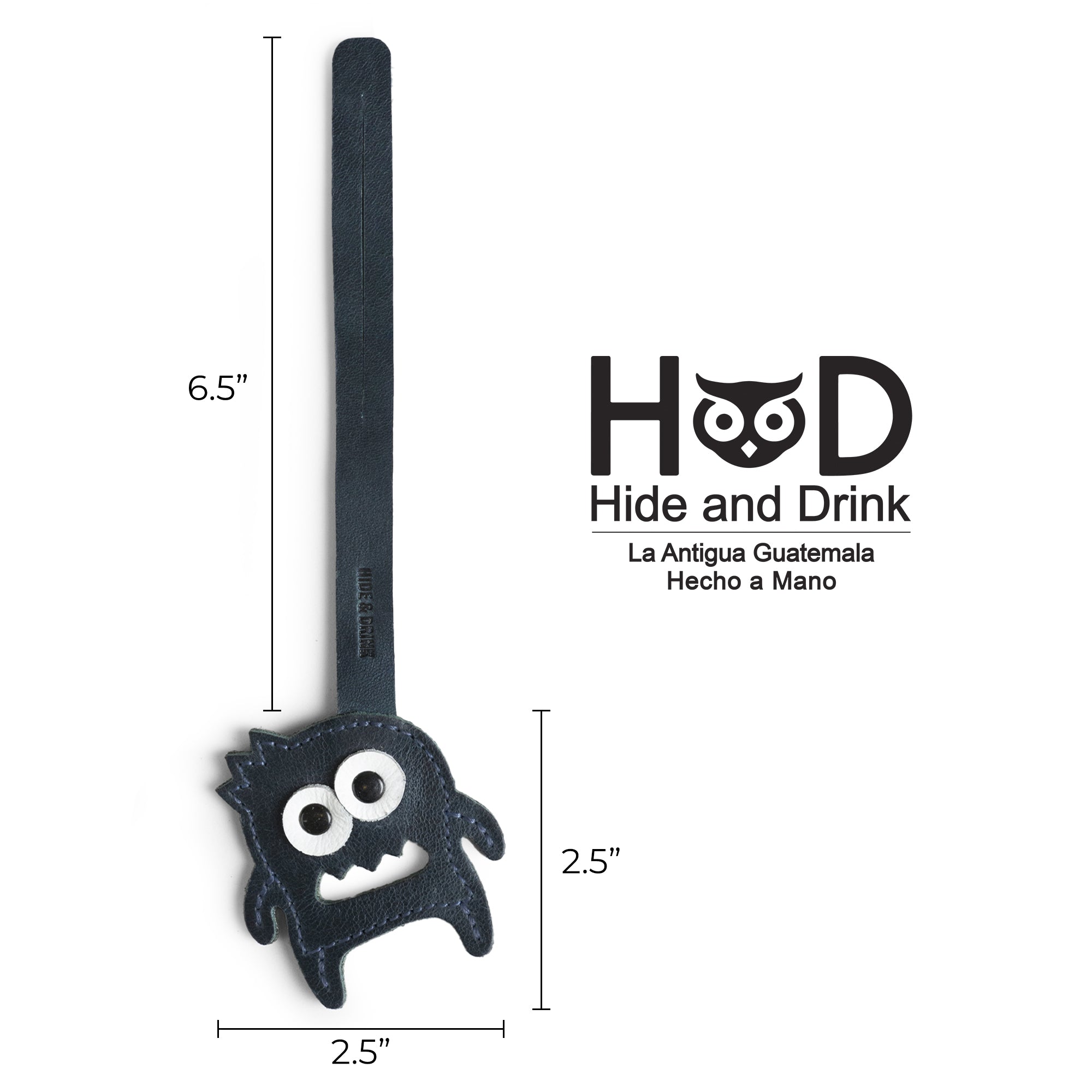 Hide & Drink Bag Charms illustrating dimensions for an elegant skull design with floral details. This charm for handbags serves as a purse charm for tote & backpacks crafted from high-quality full grain leather. Capturing StockyardX's commitment to small batch production, each piece features hand cut, hand sewn artistry and fire branding, handmade in La Antigua Guatemala & Oaxaca Mexico.