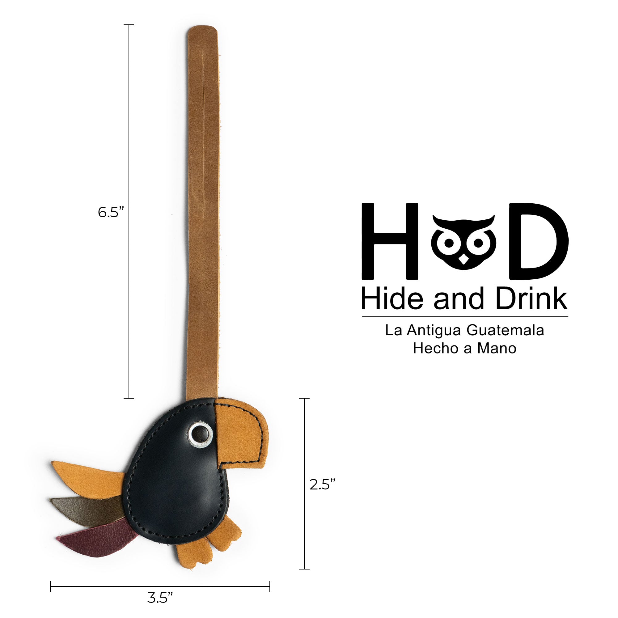 Hide & Drink Bag Charms illustrating dimensions for a charming luchador mask design. This charm for handbags is ideal as a purse charm for tote & backpacks, made from quality full grain leather. Capturing StockyardX's dedication to small batch production, each piece showcases hand cut and hand sewn artistry along with fire branding, handmade in La Antigua Guatemala & Oaxaca Mexico.