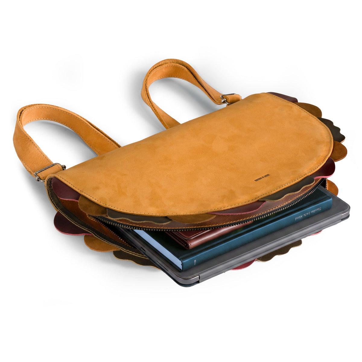 Hide & Drink Taco Backpack shown open with room for essentials, a Taco Backpack and Fashion Zippered Bag with Carry Pack with Adjustable Shoulder Straps, Fun Carryalls style, Casual Daypack design, and Travel Accessory appeal; made from Full Grain Leather by StockyardX through Small Batch Production, Hand Cut and Hand Sewn with Fire Branded Artisan details, Handmade in La Antigua Guatemala & Oaxaca Mexico.