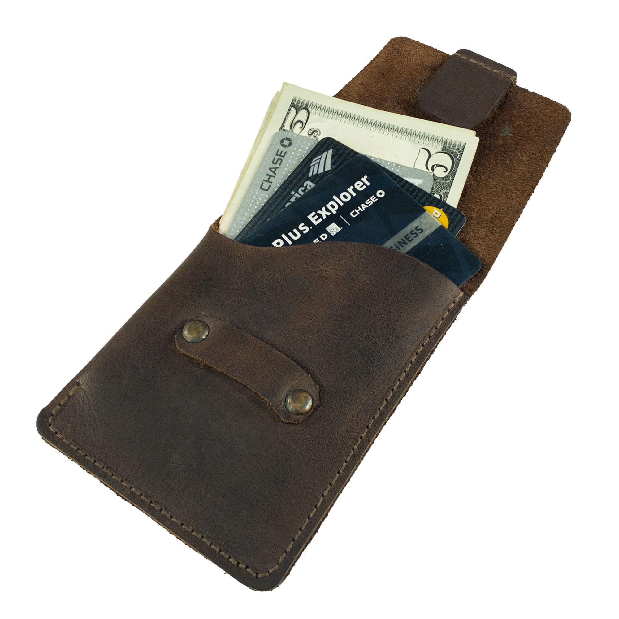 Hide & Drink Slim Card Holder showcasing its design with cards and folded bills, this full grain leather wallet is ideal for organizing up to 4 cards plus cash. This pocket wallet is crafted by artisans in La Antigua Guatemala, emphasizing small batch production and handmade quality.
