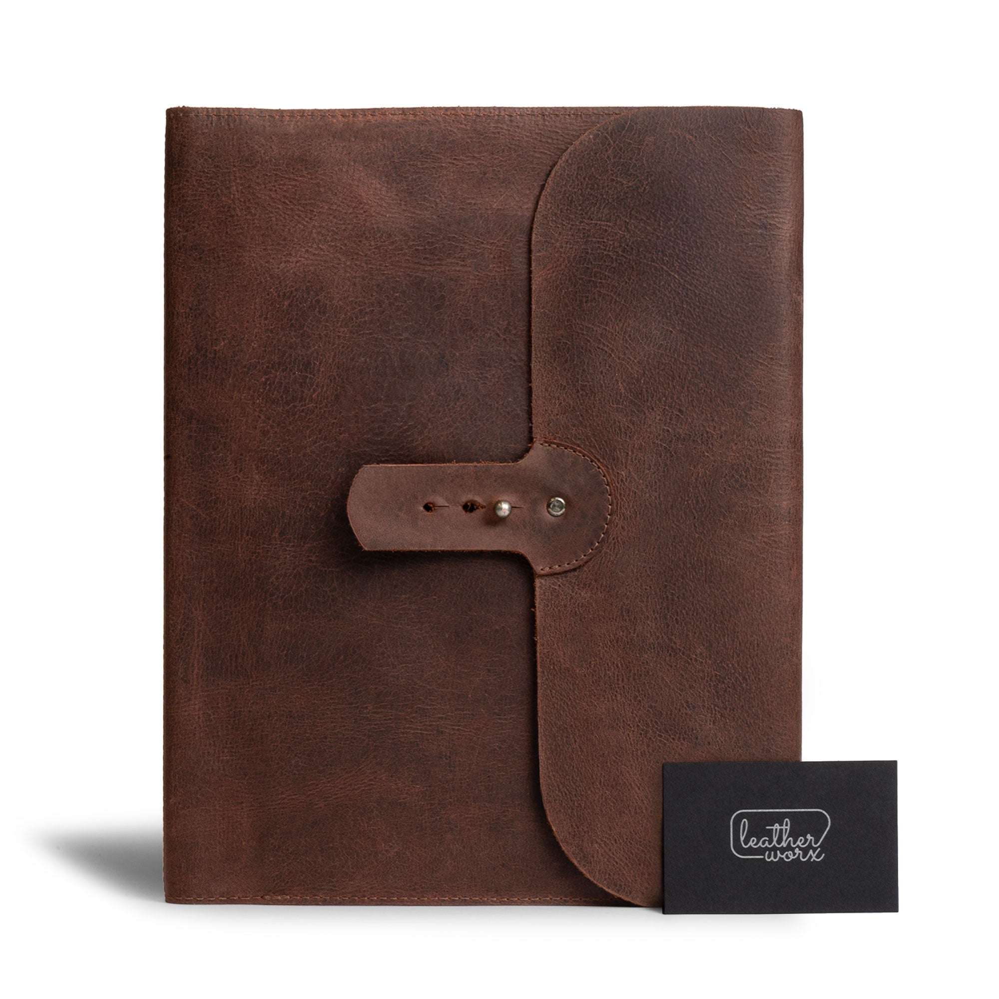 Closed view of the Leather Worx Portfolio Moleskine Cover (8.5 x 11 in.) featuring a secure button closure and rustic design, crafted from Full Grain Leather. A stunning option as a Moleskine Cover (8.5 x 11 in.) Executive Portfolio for Business and Personal Planner for Men & Women, artfully handmade in La Antigua Guatemala & Oaxaca Mexico.