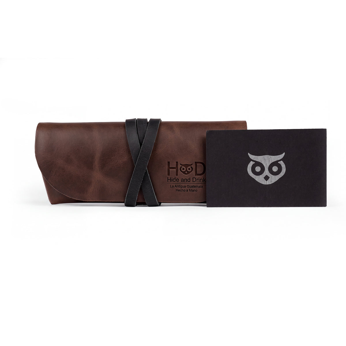 Hide & Drink Leather Sunglass Wrap is the perfect travel accessory to keep your sunglasses safe. This stylish sunglass wrap is crafted with soft full grain leather, providing excellent eye glasses storage. Each piece is artisan crafted, hand cut, and hand sewn in La Antigua Guatemala.