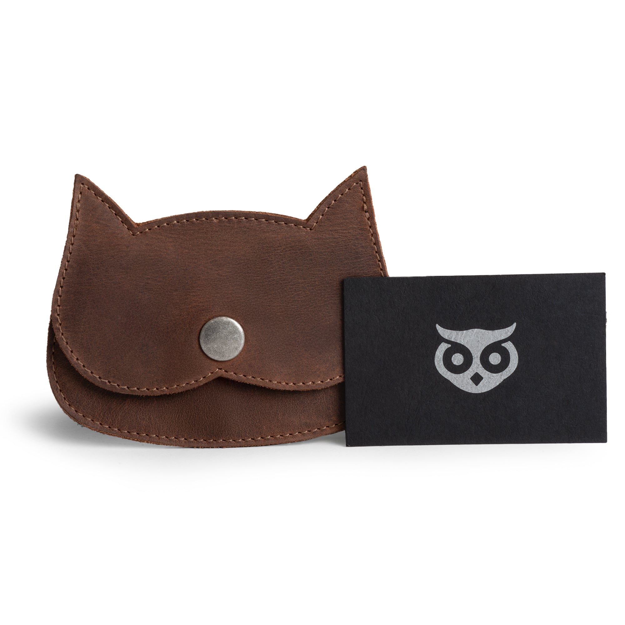Hide & Drink Leather Cat Wallet displaying its unique craftsmanship. This Cat-Shaped Wallet in Full Grain Leather is ideal for holding cards and cash, serving as a Coin Case or Travel Accessory made by artisans in La Antigua Guatemala & Oaxaca Mexico.
