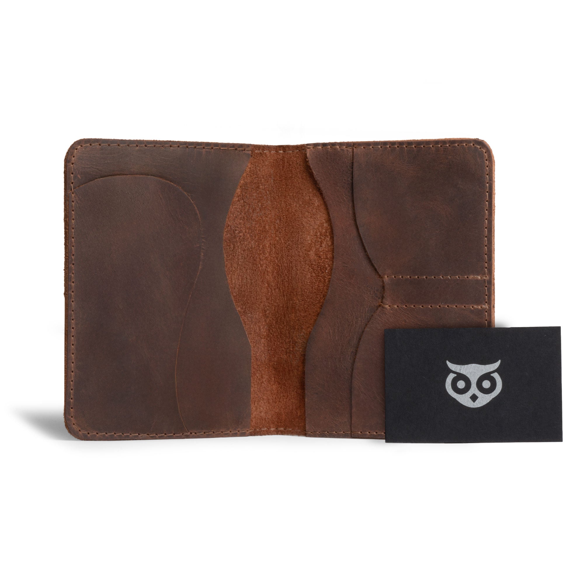 Open view of the Hide & Drink Double Passport Wallet W/Key Slot, made from durable full grain leather with slots for IDs, bills, and keys, featuring artisan craftsmanship from La Antigua Guatemala & Oaxaca Mexico.