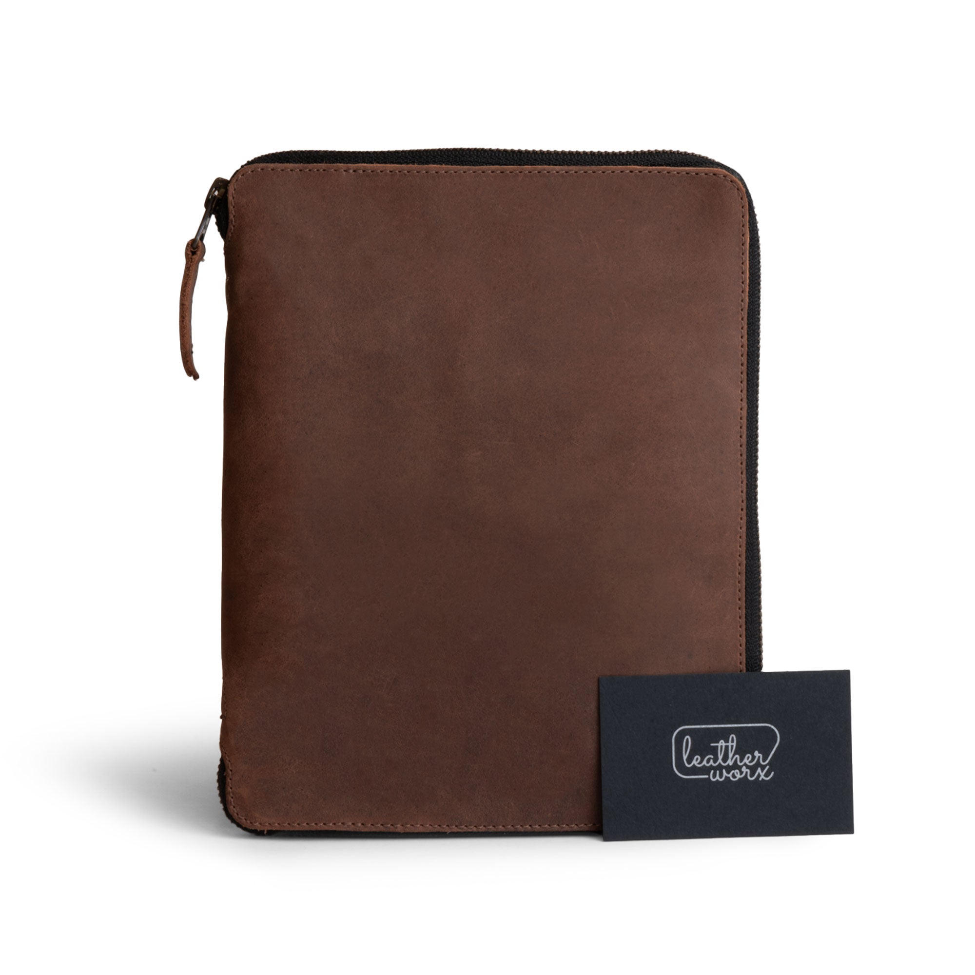 Exterior view of the Rustic A5 Notebook (5.75 x 8.25 inch.) Portfolio Binder with Leather Worx branding and a minimalistic design. Ideal as an Executive Padfolio for Office or Personal Planner for Men and Women, made from Full Grain Leather, featuring StockyardX quality along with Small Batch Production, Hand Cut, Hand Sewn, Fire Branded, Artisan craftsmanship, Handmade in La Antigua Guatemala & Oaxaca Mexico.