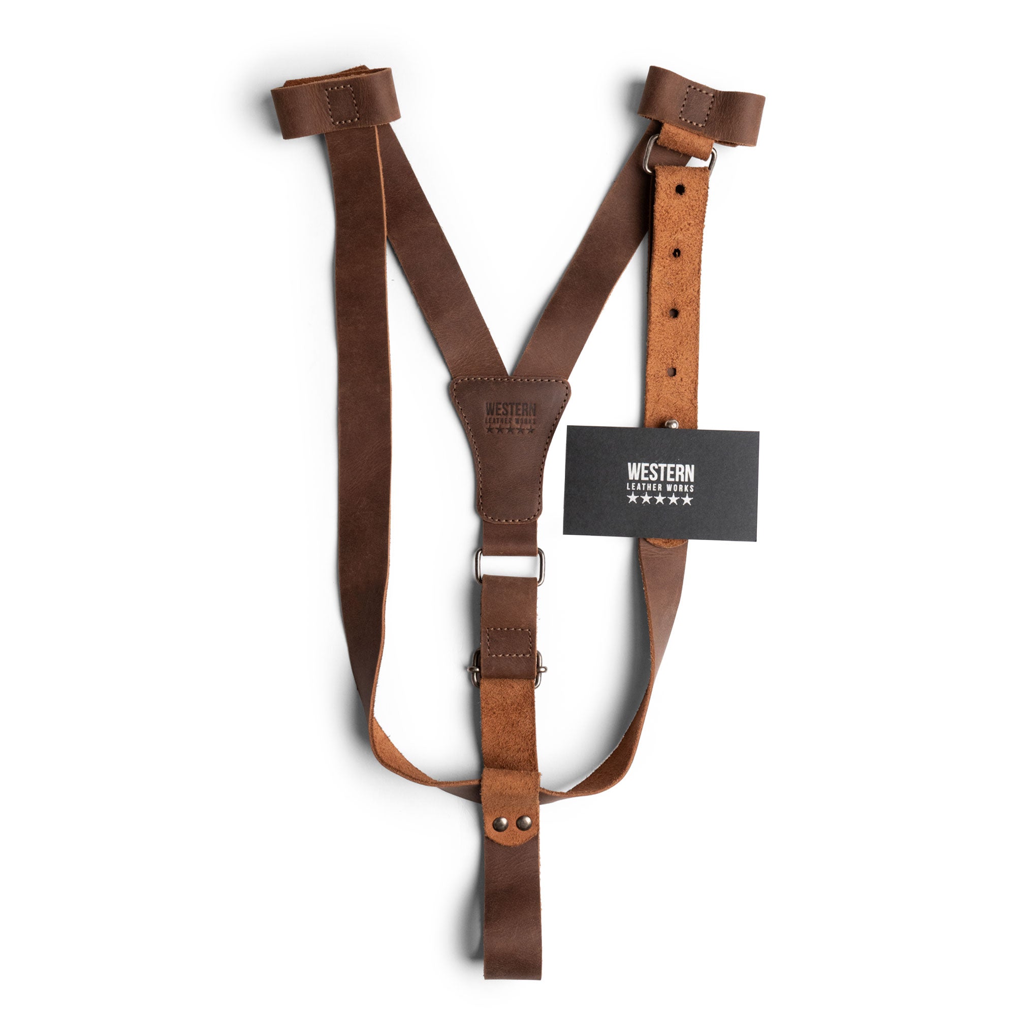 Product display of the Travel Hat Harness by Western Leather Works, designed to transport hats conveniently. Made from premium full grain leather, this hat holder for travel pairs well with any bag or backpack, reflecting artisan skills in La Antigua Guatemala through meticulous hand-cut and hand-sewn production.