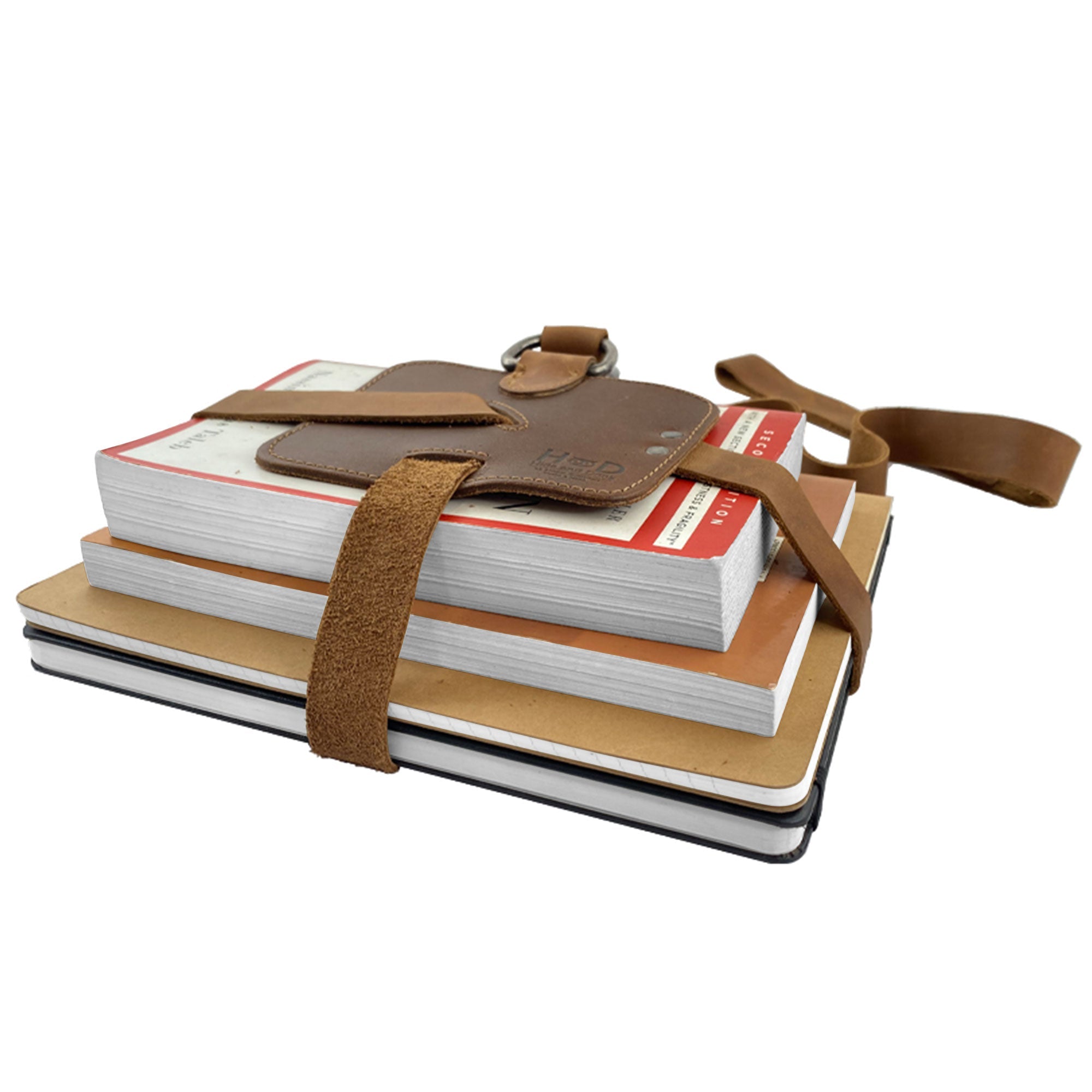 Close-up view of the Hide & Drink Book Strap Carrier, emphasizing its strong craftsmanship and elegant design. Made from Full Grain Leather, this artisan product from La Antigua Guatemala is a must-have for book lovers.