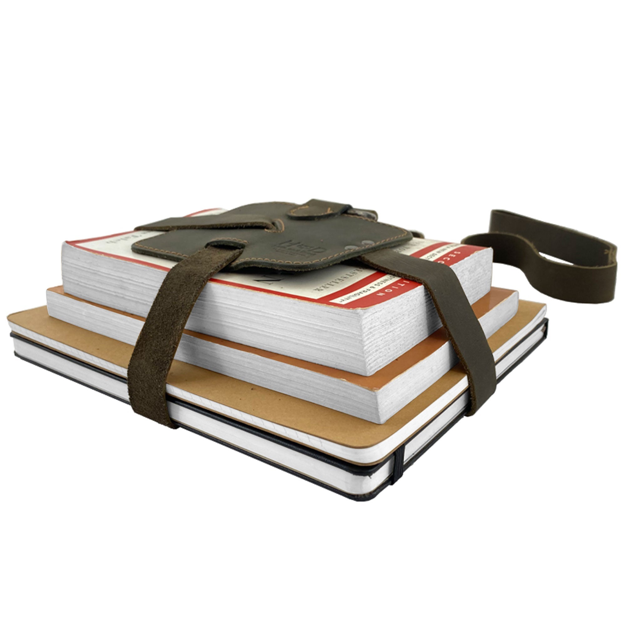 Hide & Drink Book Strap Carrier used with notebooks, showcasing its ergonomic design. This Full Grain Leather accessory is artisan-crafted in La Antigua Guatemala and is perfect for readers on the go.