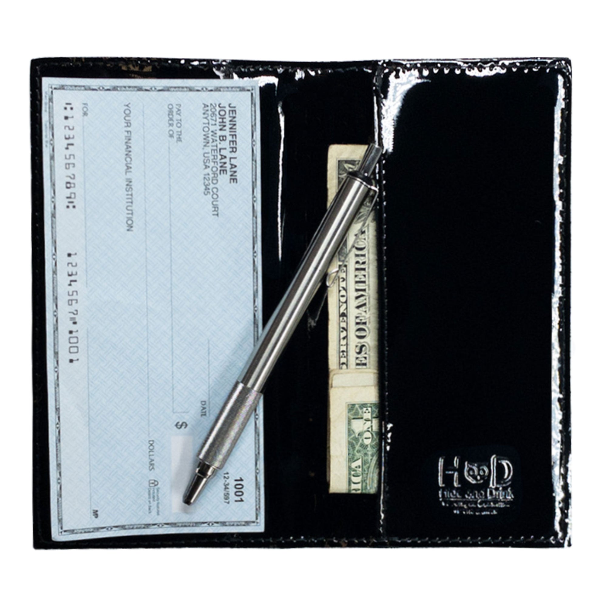 Checkbook Leather Cover by Hide & Drink, presented in a bold color, serving as a minimalist organizer for standard checkbooks. This handmade item, crafted from full grain leather, emphasizes small batch production and artisan quality from La Antigua Guatemala and Oaxaca Mexico.