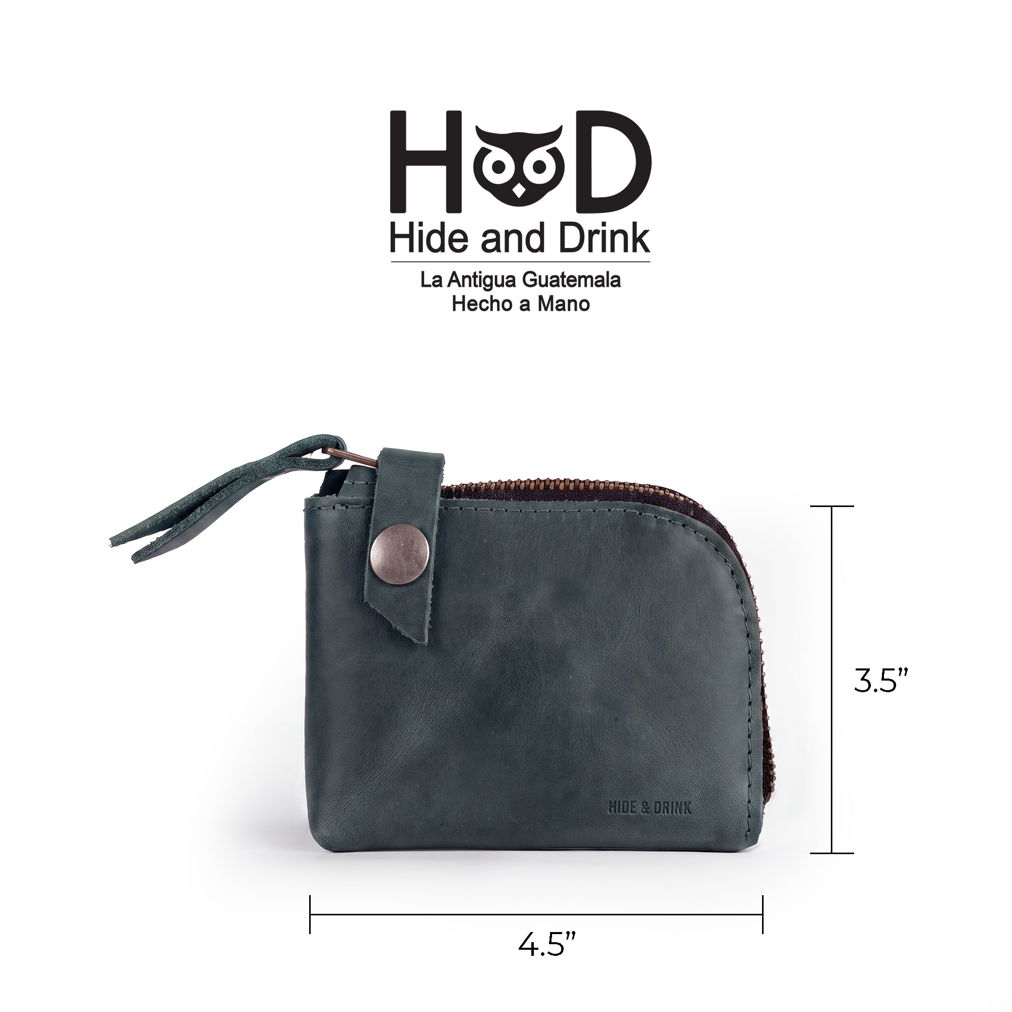 Size comparison of the black Lion's Mane Zippered Wallet by Hide & Drink with a credit card, highlighting its compact, artisan-crafted design.