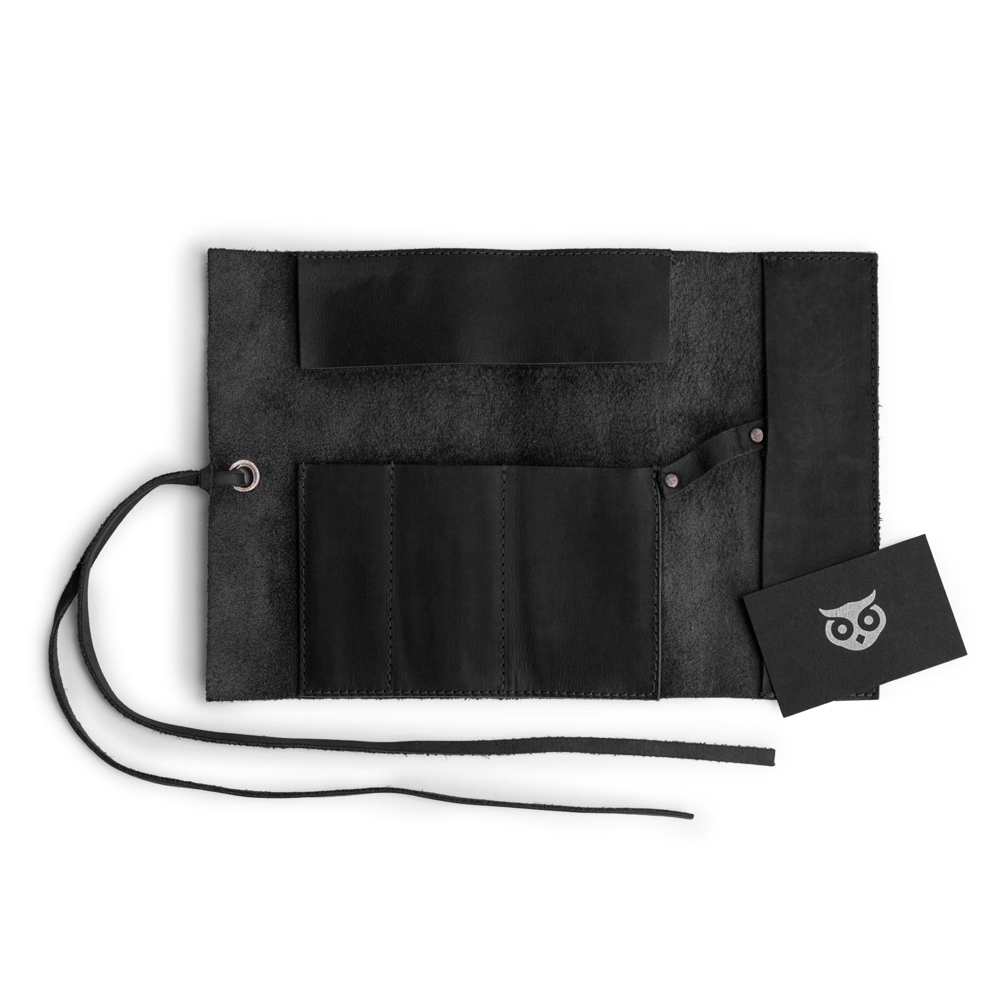 A glance at the interior of the Multi Purpose Pencil Roll from Hide & Drink, displaying its carefully crafted full grain leather. This versatile pencil roll pouch works as a multi-purpose storage wrap for scissors and earphones, showcasing artisan craftsmanship from La Antigua Guatemala & Oaxaca Mexico.