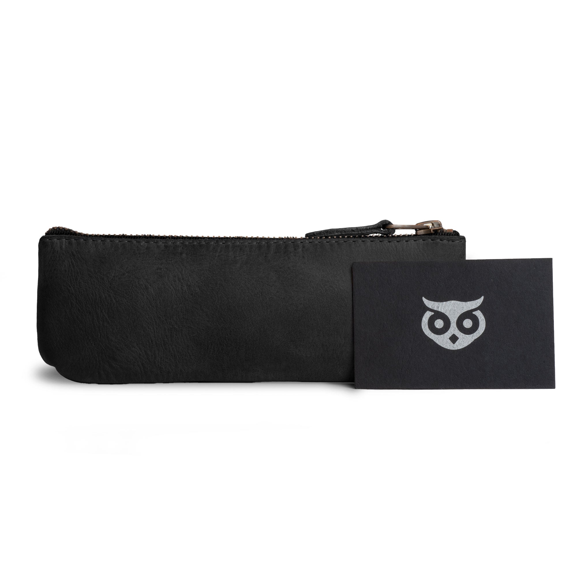 Hide & Drink Pencil Pouch highlighted for its elegant structure and artisan branding, ideal for anyone looking for a stylish writing instrument holder. This rectangular pencil pouch is made from full grain leather, showcasing its handmade quality from La Antigua Guatemala & Oaxaca Mexico, perfect for both men and women.