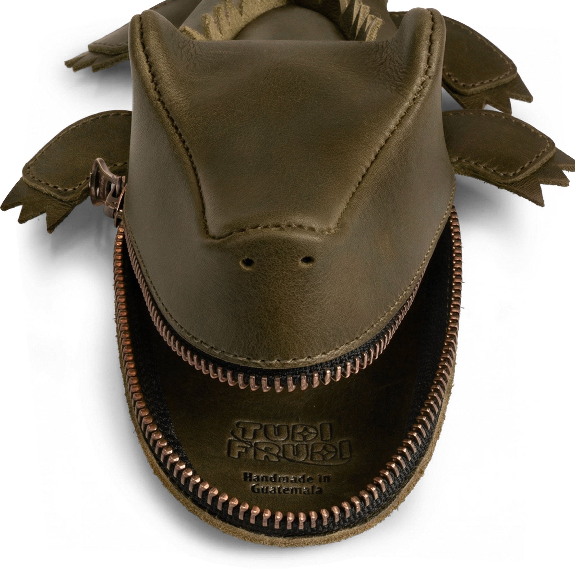 Gator Leather Pouch by Tudi Frudi featuring a close-up view of the zipper and detailing. This crocodile-shaped design serves as a stylish scissors case and purses & pouches for cash, made from high-quality full grain leather by skilled artisans in La Antigua Guatemala and Oaxaca Mexico.