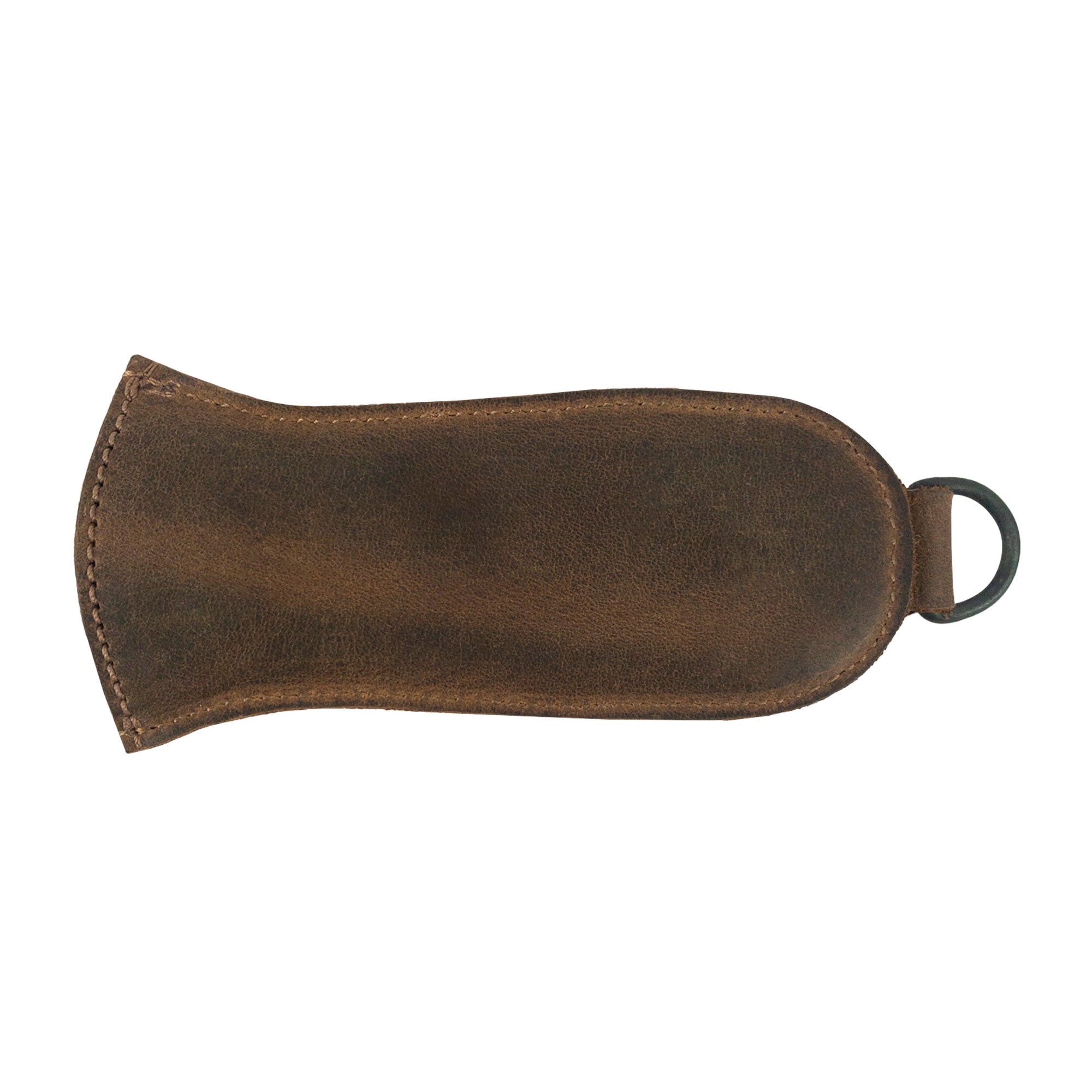 Hanging Pan Handle Cover by Cast Leather Co. showcasing its stylish profile, a practical Hot Handle Panhandle with Half Ring made from full grain leather. This accessory seamlessly allows cookware to slide on/off easily onto metal skillet grips, embodying artisan craftsmanship from La Antigua Guatemala & Oaxaca Mexico.