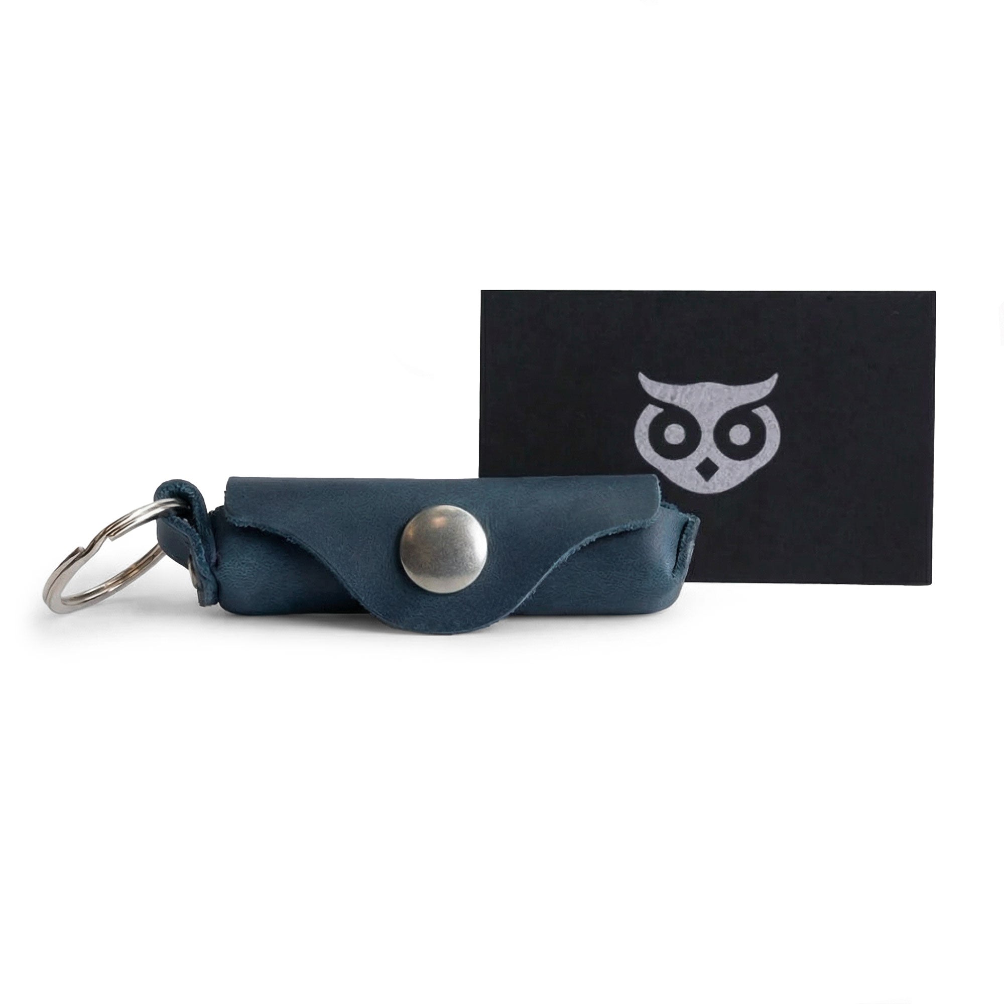 Showcasing a full view of the Hide & Drink Lip Balm Key Chain with its stylish packaging, reinforcing its status as a classic vintage lip balm keychain holder made from premium full grain leather.