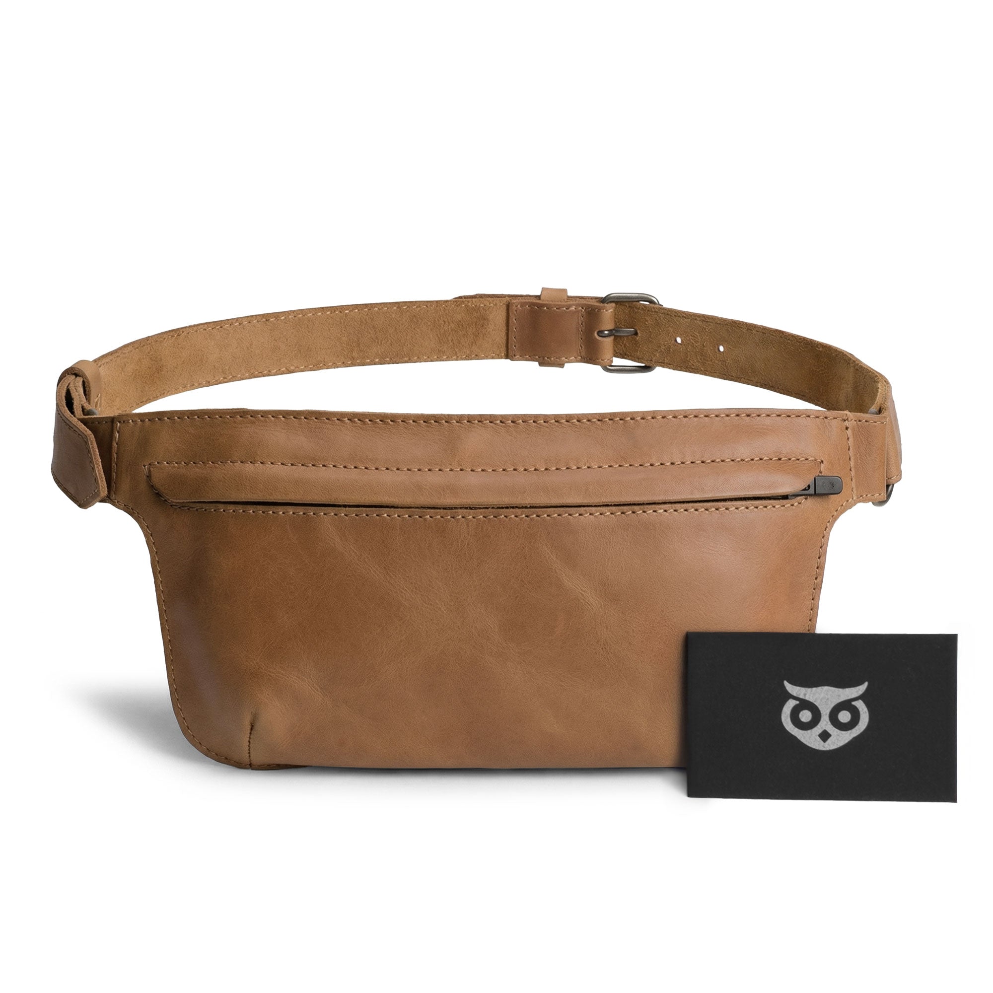 Slim Fanny Pack by Hide & Drink with an open zipper view, perfect for easy access to essentials. This artisan-crafted full grain leather fanny pack embodies quality and functionality, handmade in Oaxaca Mexico.