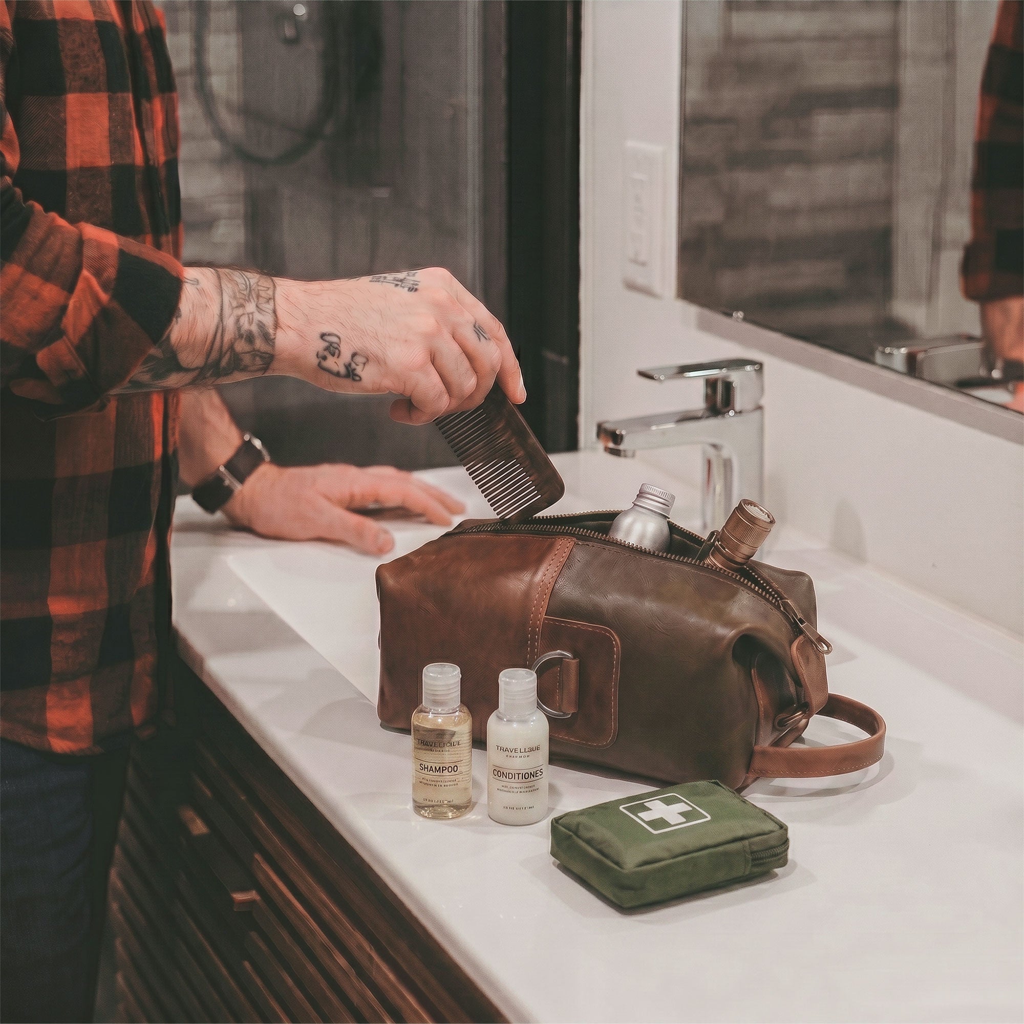 The Vintage Adventure Dopp Kit by Littlefield Chicago in use, prominently featuring the stylish leather bag as a toiletries organizer for men while grooming, capturing its artisan craftsmanship and durable design.