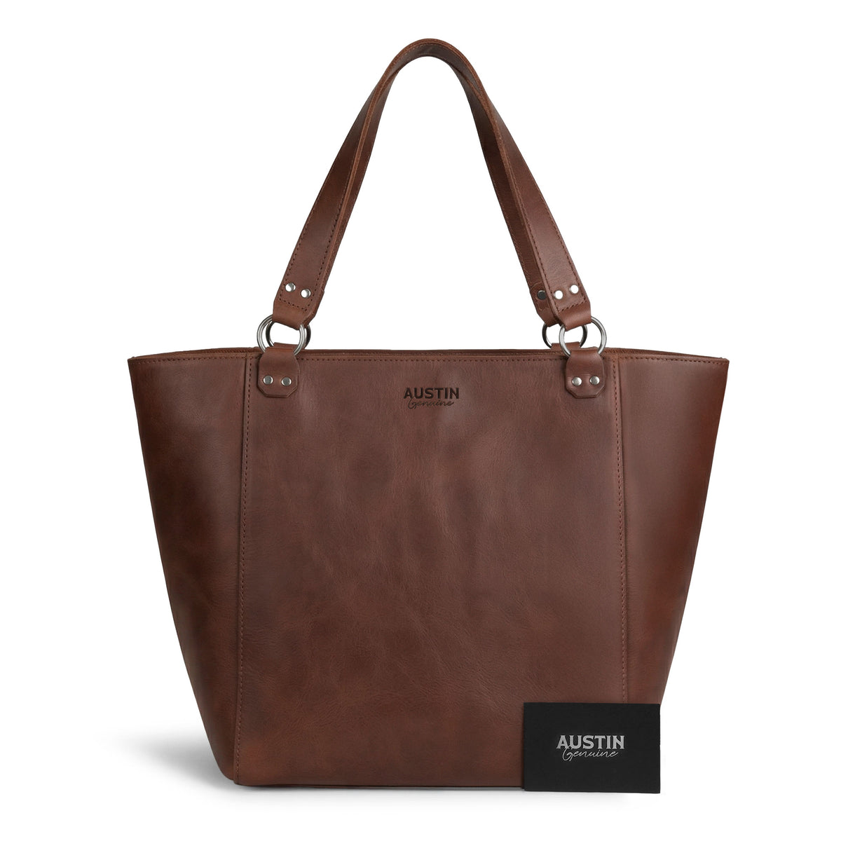 Austin Genuine Formal Handbag in rich brown full grain leather shown from the front with the Austin Genuine brand card; a stylish Formal Tote Bag, Female Bag, Travel and Shopping Accessory, and Handbag for Women. Formal Handbag, Full Grain Leather, StockyardX, Small Batch Production, Hand Cut, Hand Sewn, Fire Branded, Artisan, Handmade in La Antigua Guatemala & Oaxaca Mexico.