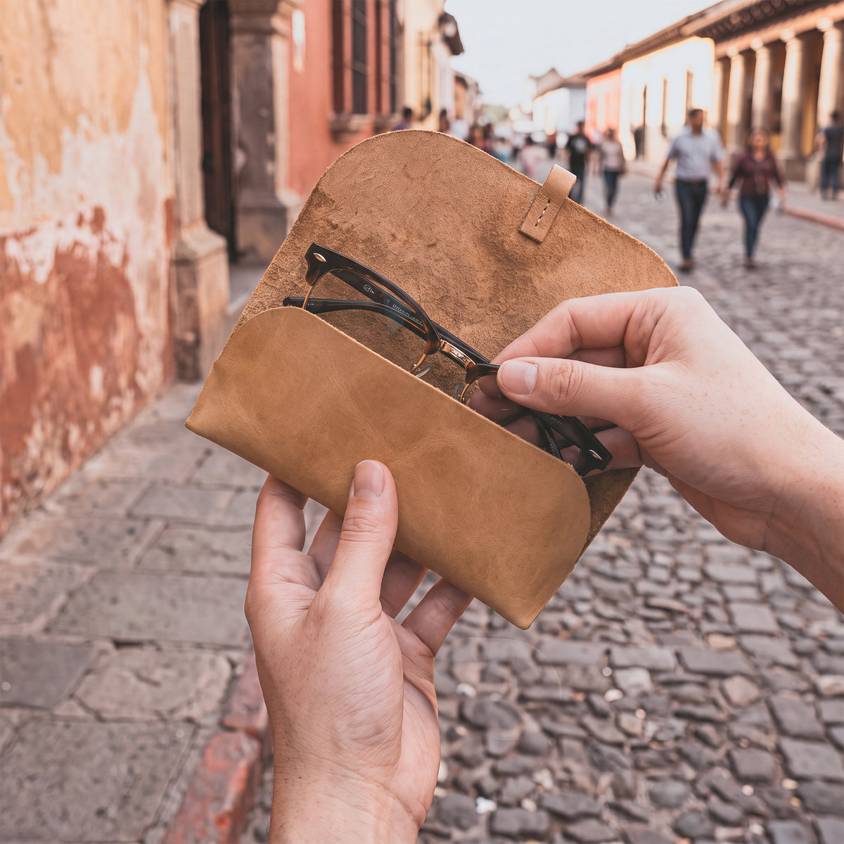 Hide & Drink Leather Sunglass Wrap is a chic and stylish solution for storing sunglasses. Made from full grain leather, it serves as an excellent eye glasses storage option for travel. Artisan crafted and hand sewn, it represents the quality of small batch production.
