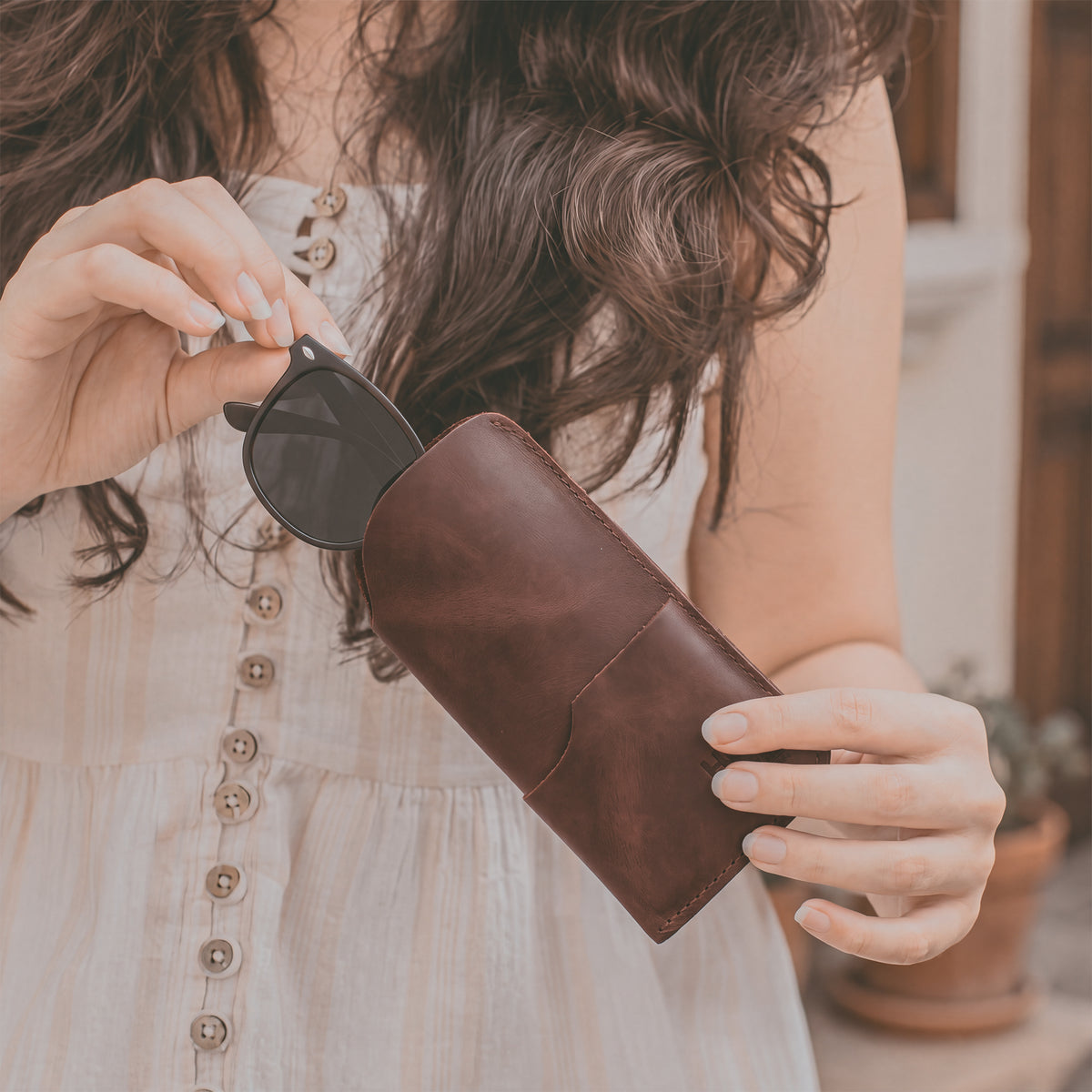 The Hide & Drink Sunglass Case & Wallet showcased elegantly in tan leather. This Rustic Sunglasses Case & Wallet combines Full Grain Leather quality with practical design, perfect as a glasses protector for travel, artisanally made in La Antigua Guatemala & Oaxaca Mexico.