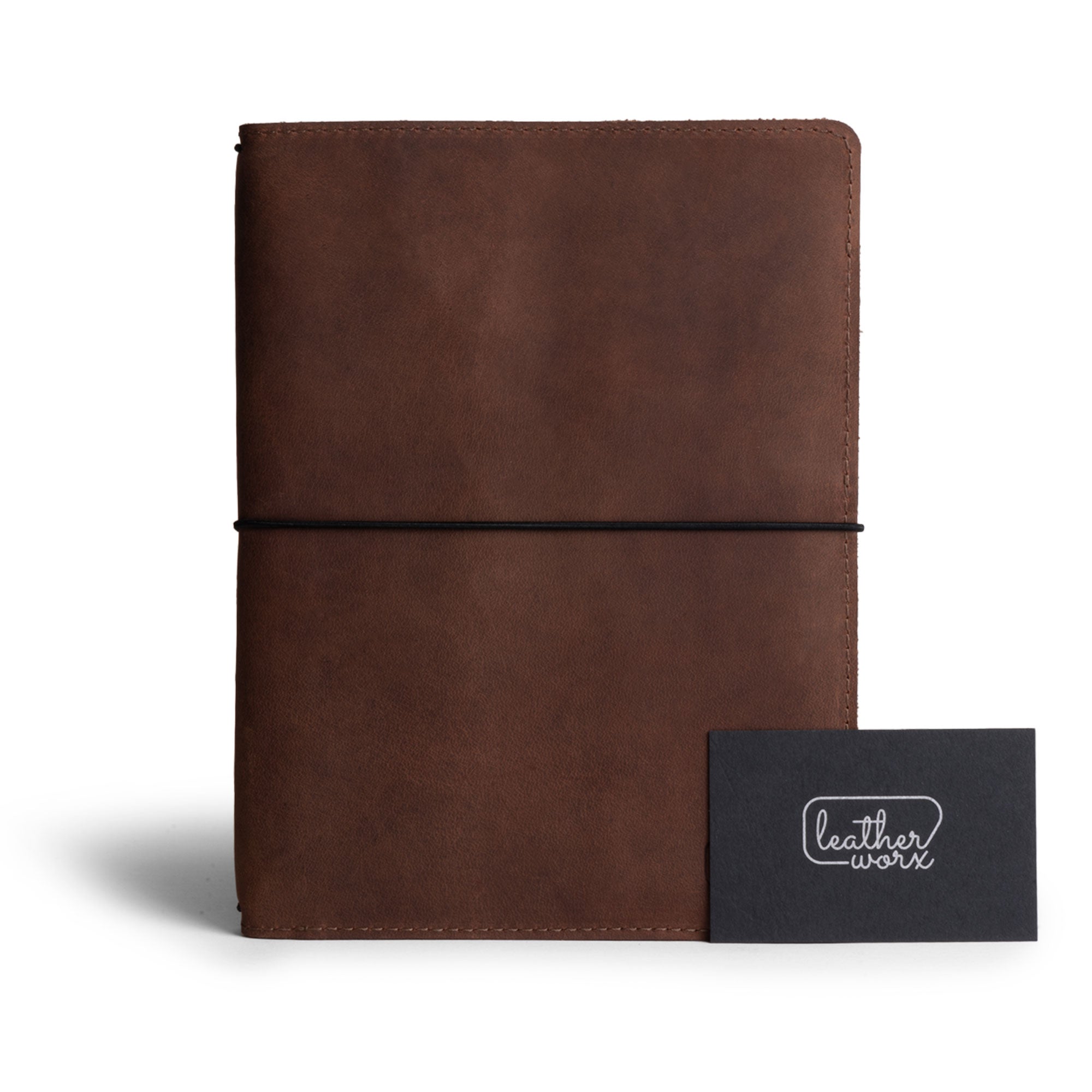 Refillable Cover for A5 Notebooks (5.75 x 8.25 in.) by Leather Worx, presenting the cover with business card and branding card, highlighting aesthetic qualities of the Classic Cover made from durable full grain leather, representing small batch production, hand cut, hand sewn artistry, fire branded, artisan crafted, handmade in La Antigua Guatemala & Oaxaca Mexico.