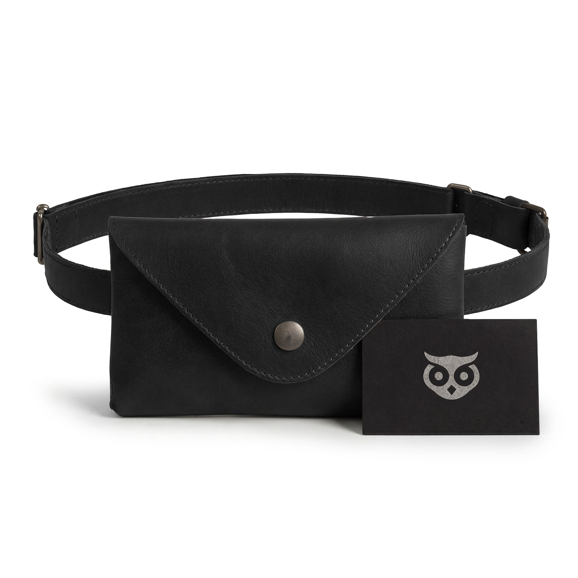 Hide & Drink's Fancy Fanny Pack showcased with branding and tags. The elegant design in full grain leather enhances its functionality as a waist pouch or vintage purse. Artisan-crafted in La Antigua Guatemala with attention to small batch production standards.