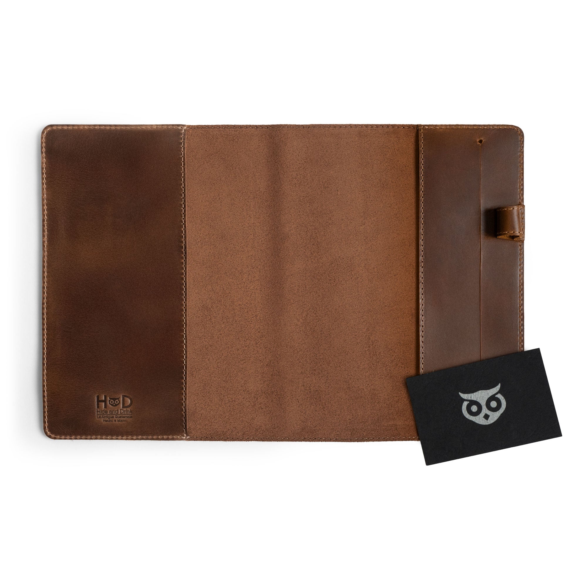 Interior view of the Cover for Leuchtturm1917 Notebook 411 Hardcover A5 Size (145 x 210 mm) by Hide & Drink with a complimentary card. This full grain leather notebook sleeve emphasizes the artisan craftsmanship and is perfect for those who appreciate handmade quality in their writing tools.