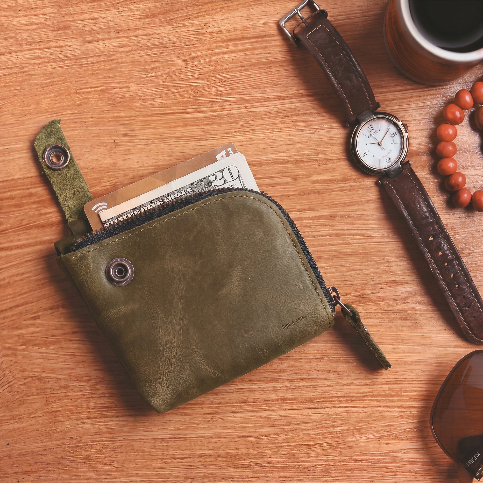 Lion's Mane Zippered Wallet by Hide & Drink, designed for effective organization of cash and cards. A stylish mini wallet providing functionality for everyday life.