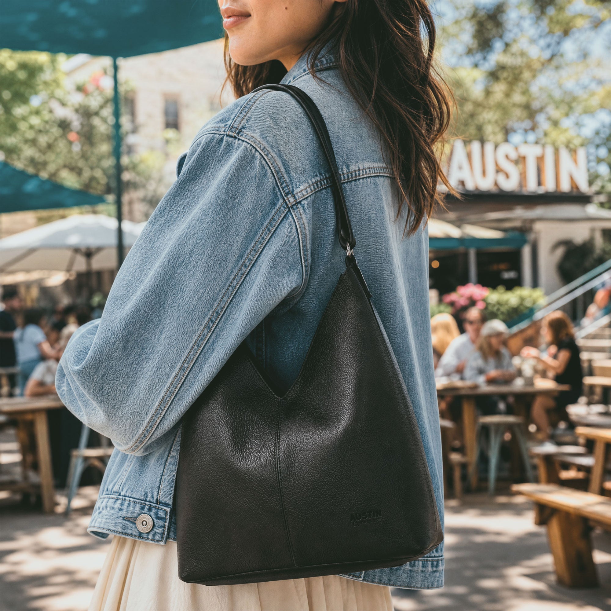 Austin Genuine The Tarrytown Hobo Bag dimensions shown in a product diagram, including 12-inch height, 11.5-inch width, 5-inch depth, and 19-to-36-inch strap. The Tarrytown Hobo Bag Full Grain Leather, StockyardX, Small Batch Production, Hand Cut, Hand Sewn, Fire Branded, Artisan, Handmade in La Antigua Guatemala & Oaxaca Mexico.