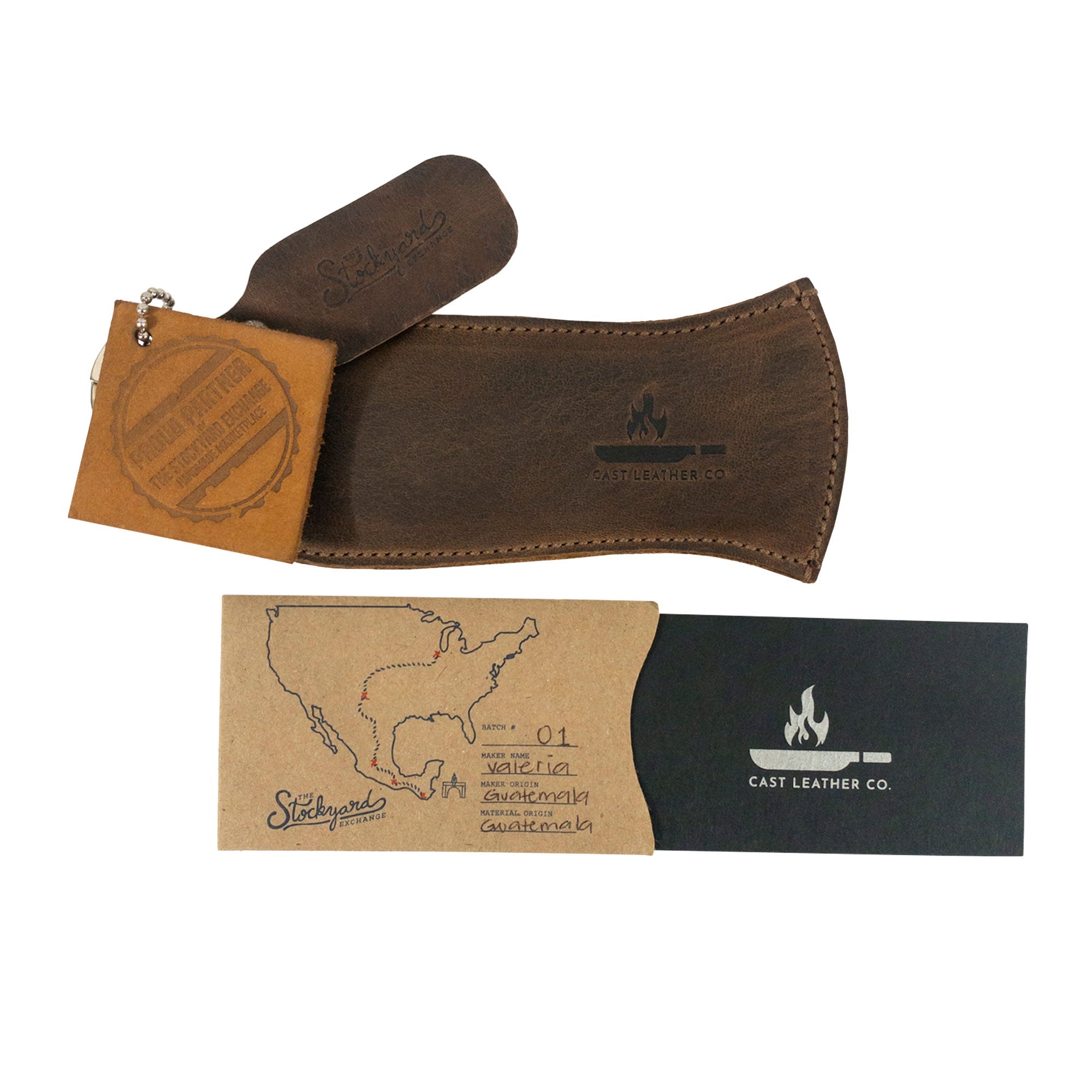 Hanging Pan Handle Cover by Cast Leather Co. featuring a presentation of this elite Hot Handle Panhandle with Half Ring alongside a card. Crafted from full grain leather, it enhances functionality by allowing cookware to slide on/off easily onto metal skillet grips, reflecting artisan dedication in small batch production from La Antigua Guatemala & Oaxaca Mexico.