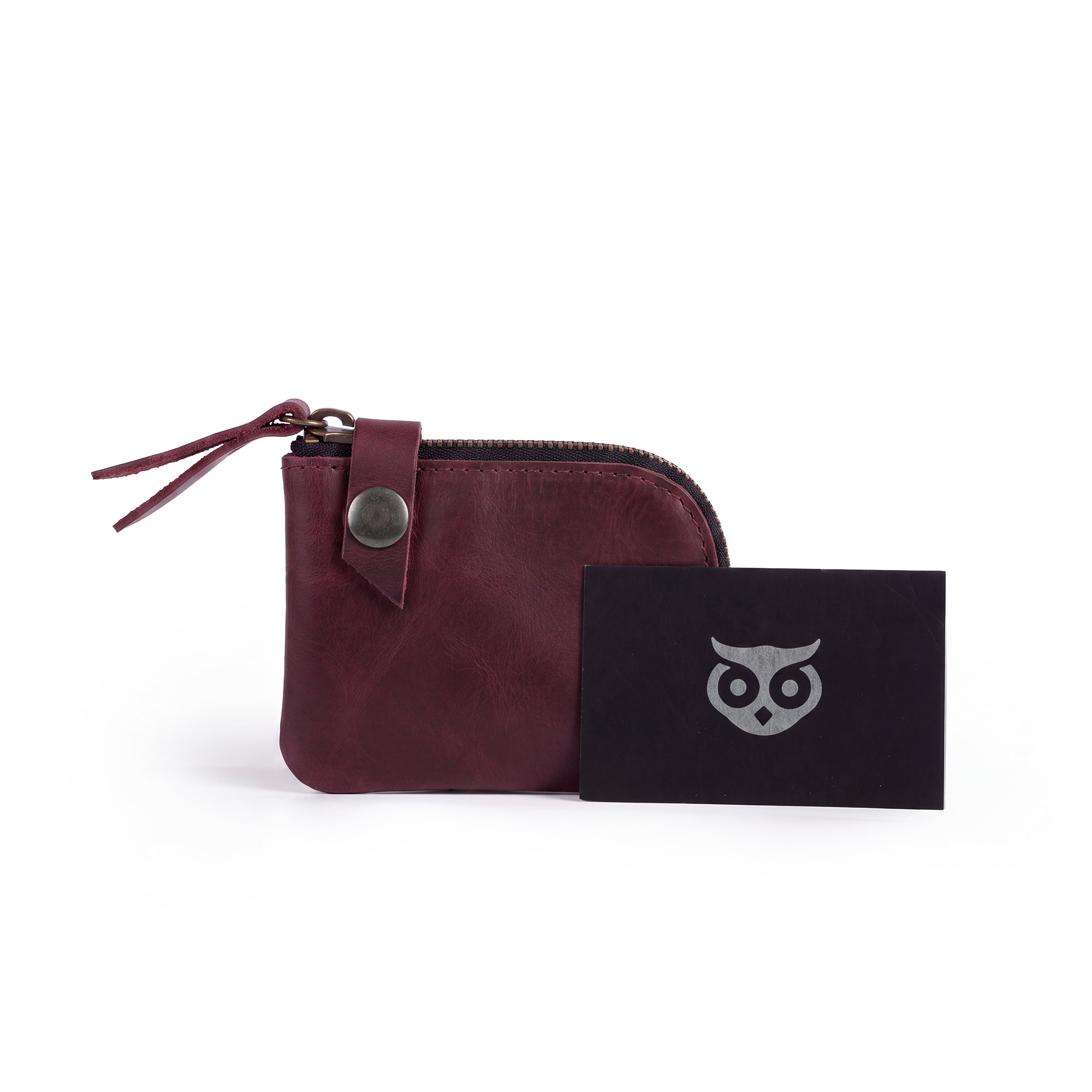Interior view of the Lion's Mane Zippered Wallet by Hide & Drink, displaying its hand-sewn craftsmanship and organized compartments for cards and cash.