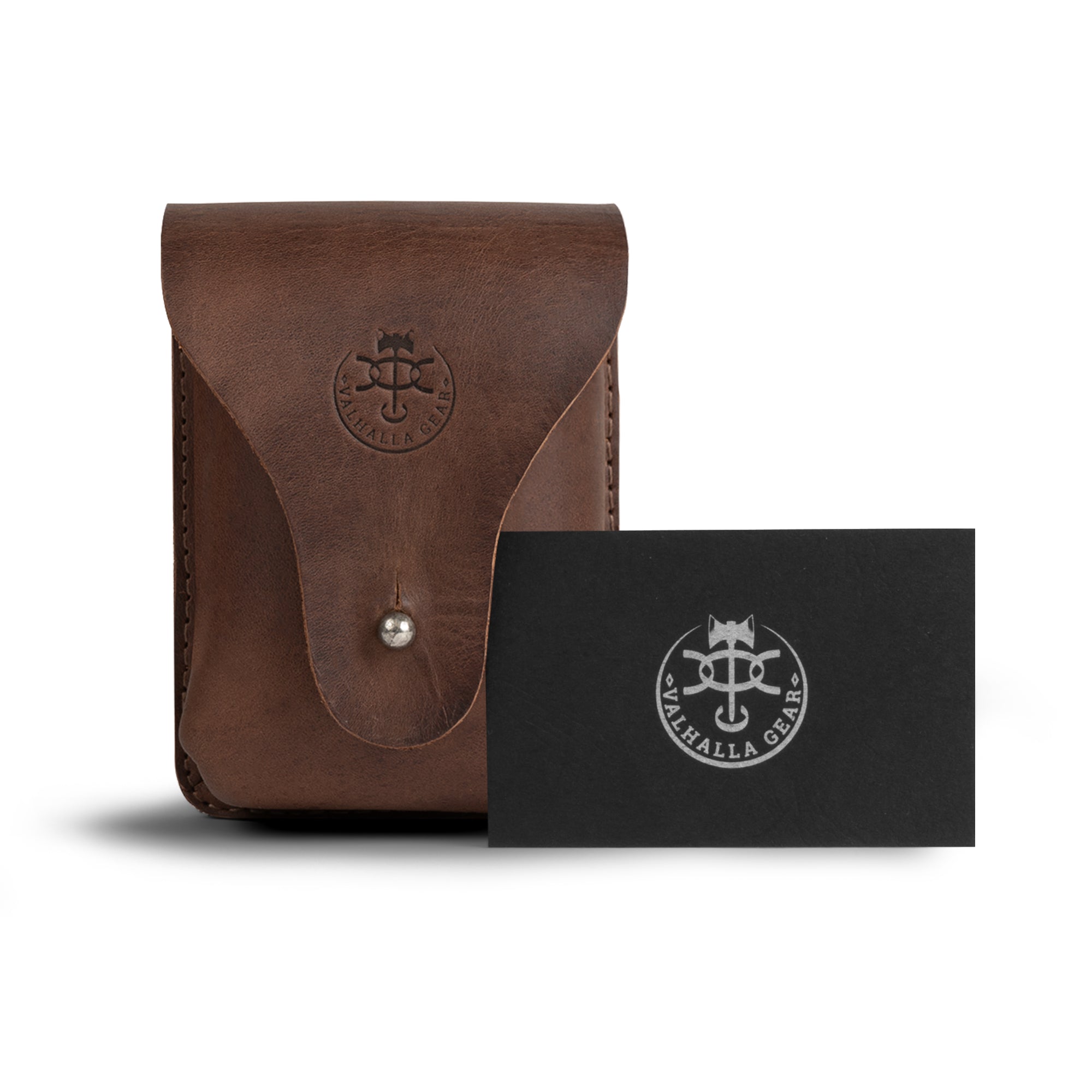 Valhalla Gear's The Herne, Bushcraft Belt Pouch next to a business card, emphasizing its premium quality. This Utility Belt Pouch for Tools is perfect for outdoor adventures, made from durable Full Grain Leather, demonstrating the artistry of Hand Cut and Hand Sewn techniques from La Antigua Guatemala & Oaxaca Mexico.