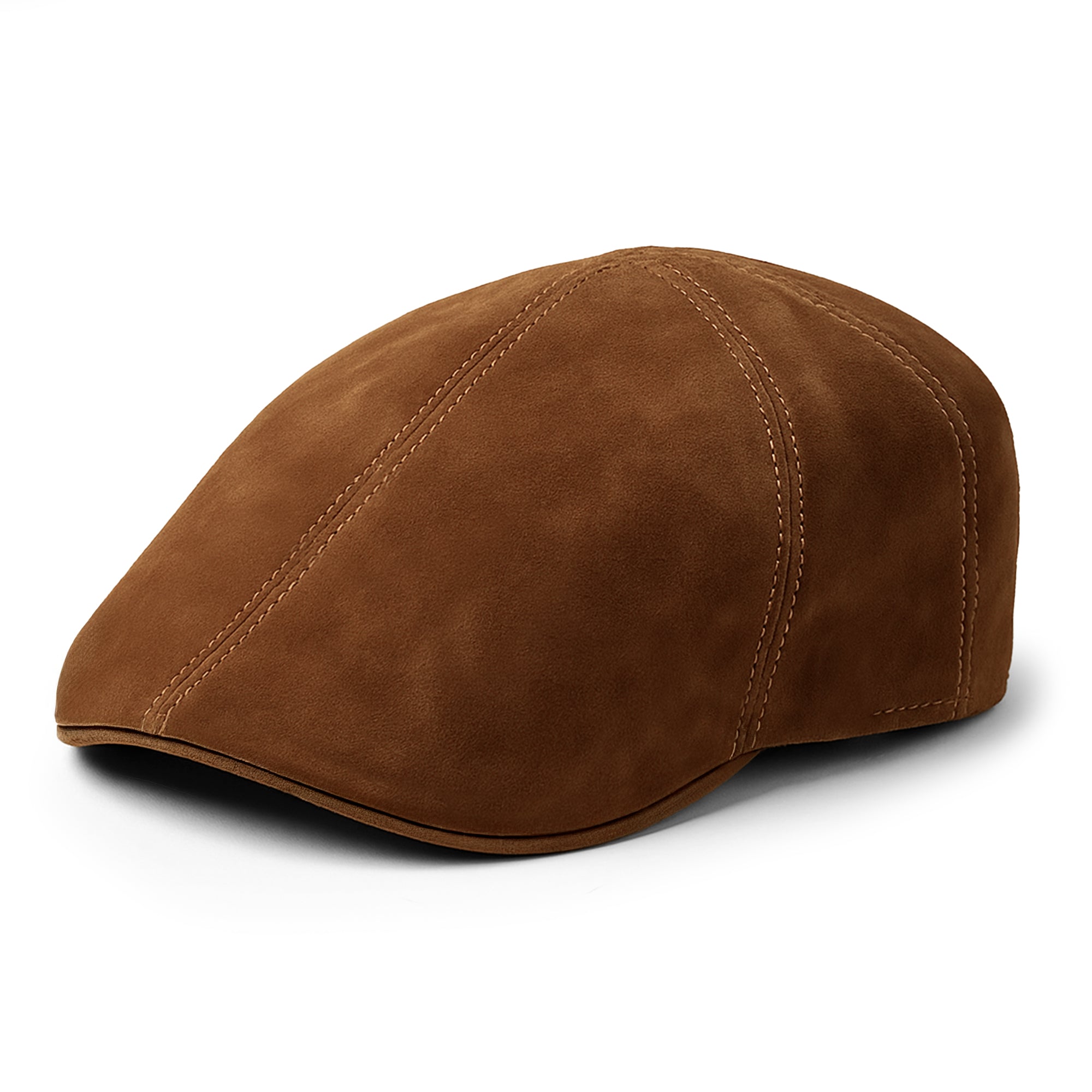 Side view of a stylish men's driver's cap made by Hide & Drink, showcasing soft suede leather. This vintage cap is perfect for adding a classic touch to any outfit. Made with full grain leather, this handcrafted cap features small batch production, ensuring quality and unique design. Ideal for those who appreciate artisan goods, handmade in La Antigua Guatemala & Oaxaca Mexico.